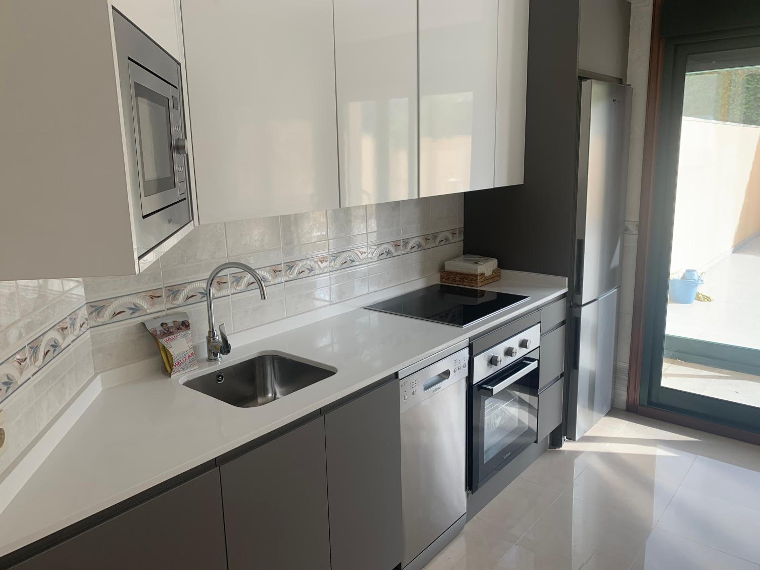 Three-Bedroom Apartment - Photo 2