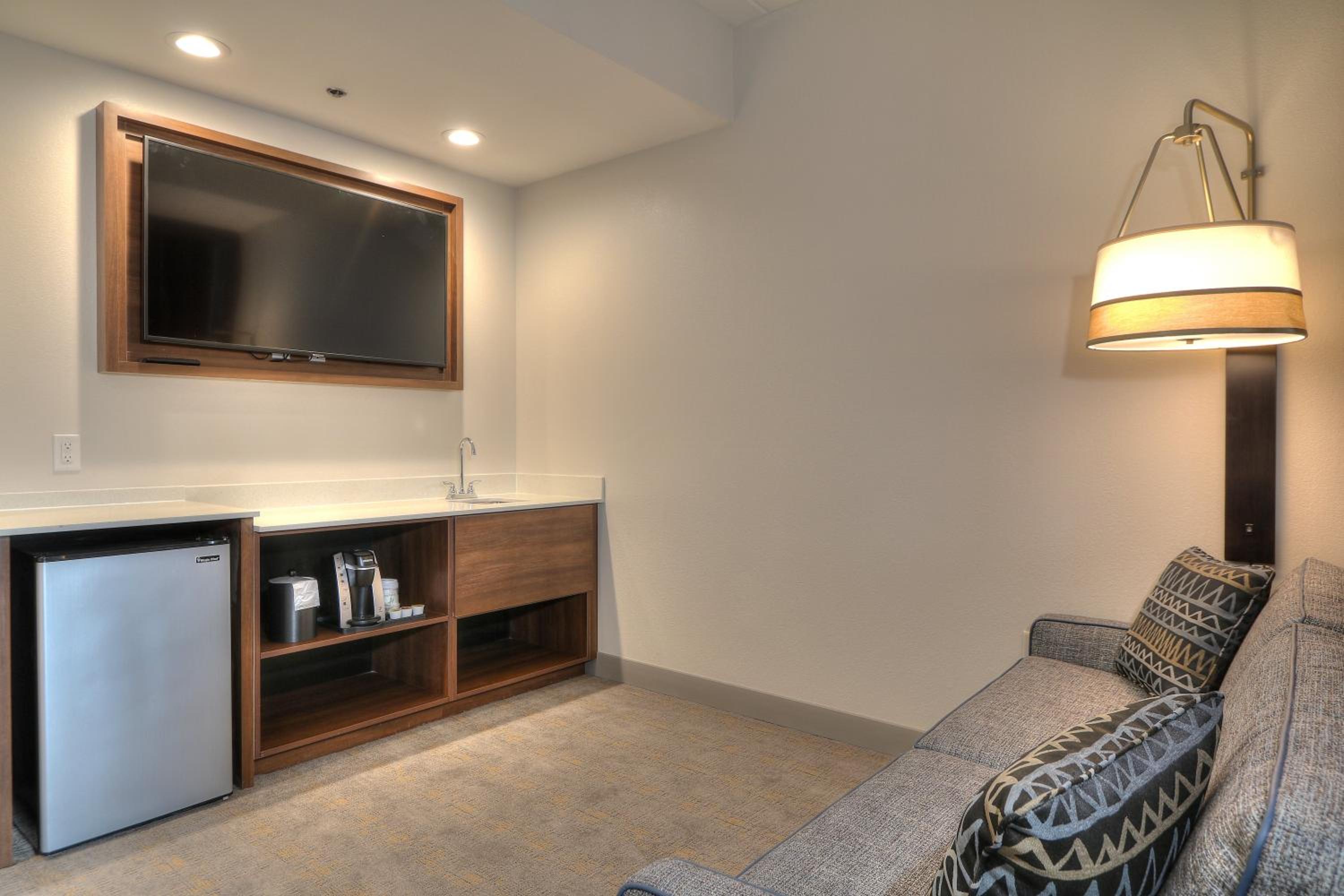 Queen Suite with Two Queen Beds Fireplace and Parkway Balcony - Photo 1