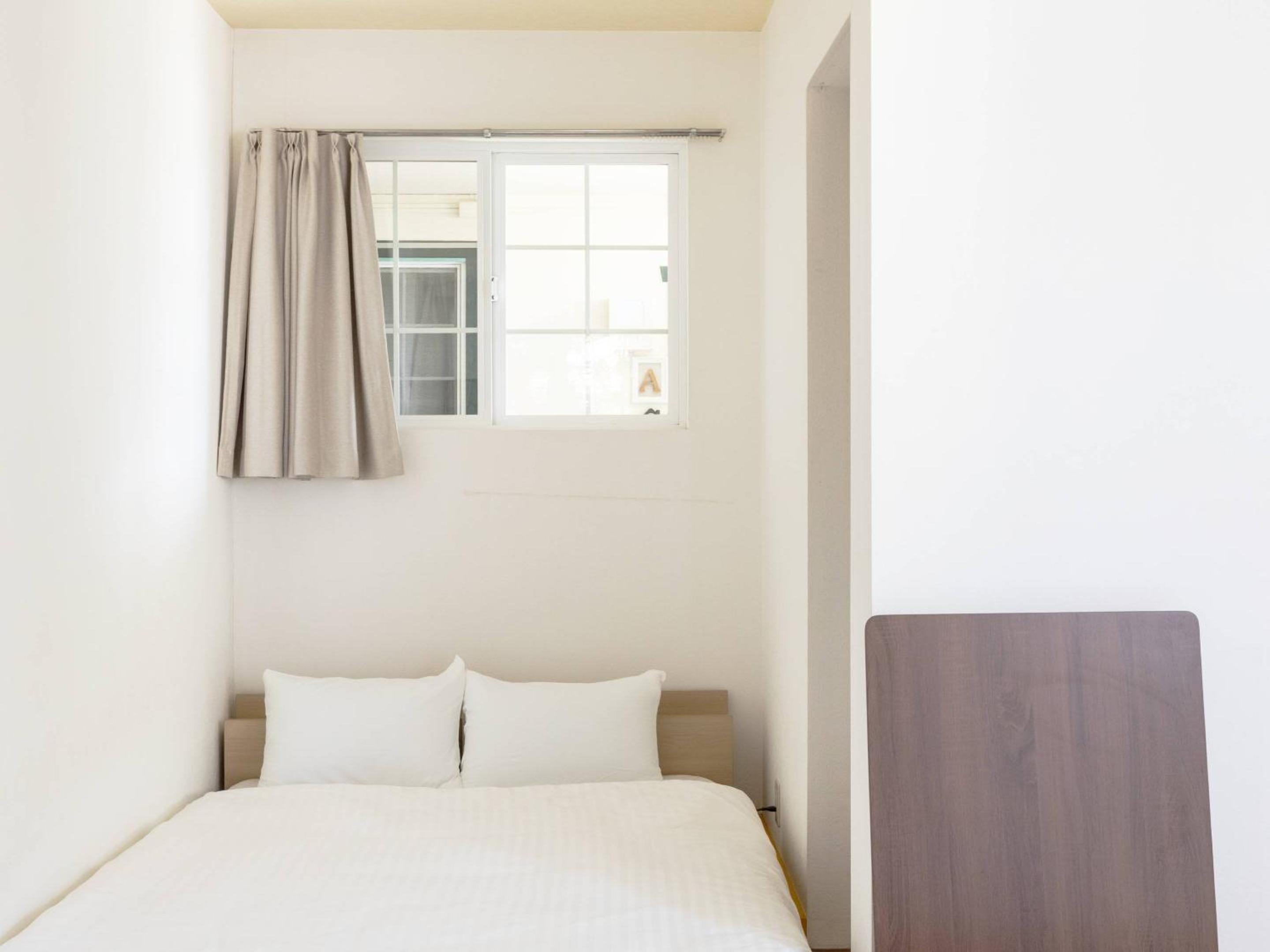 Economy Twin Room - Photo 19