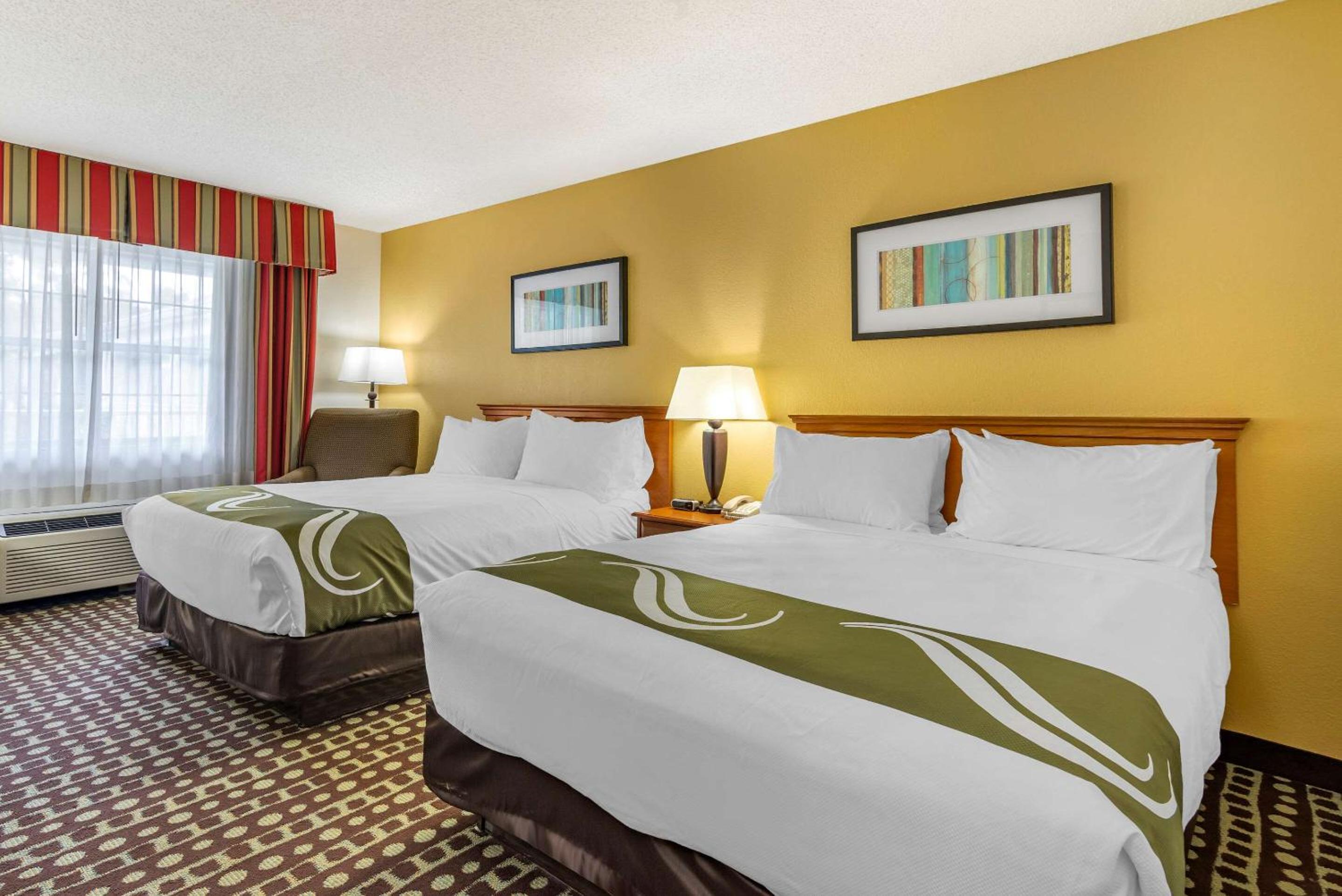 Queen Room with Two Queen Beds - Non-Smoking - Photo 1