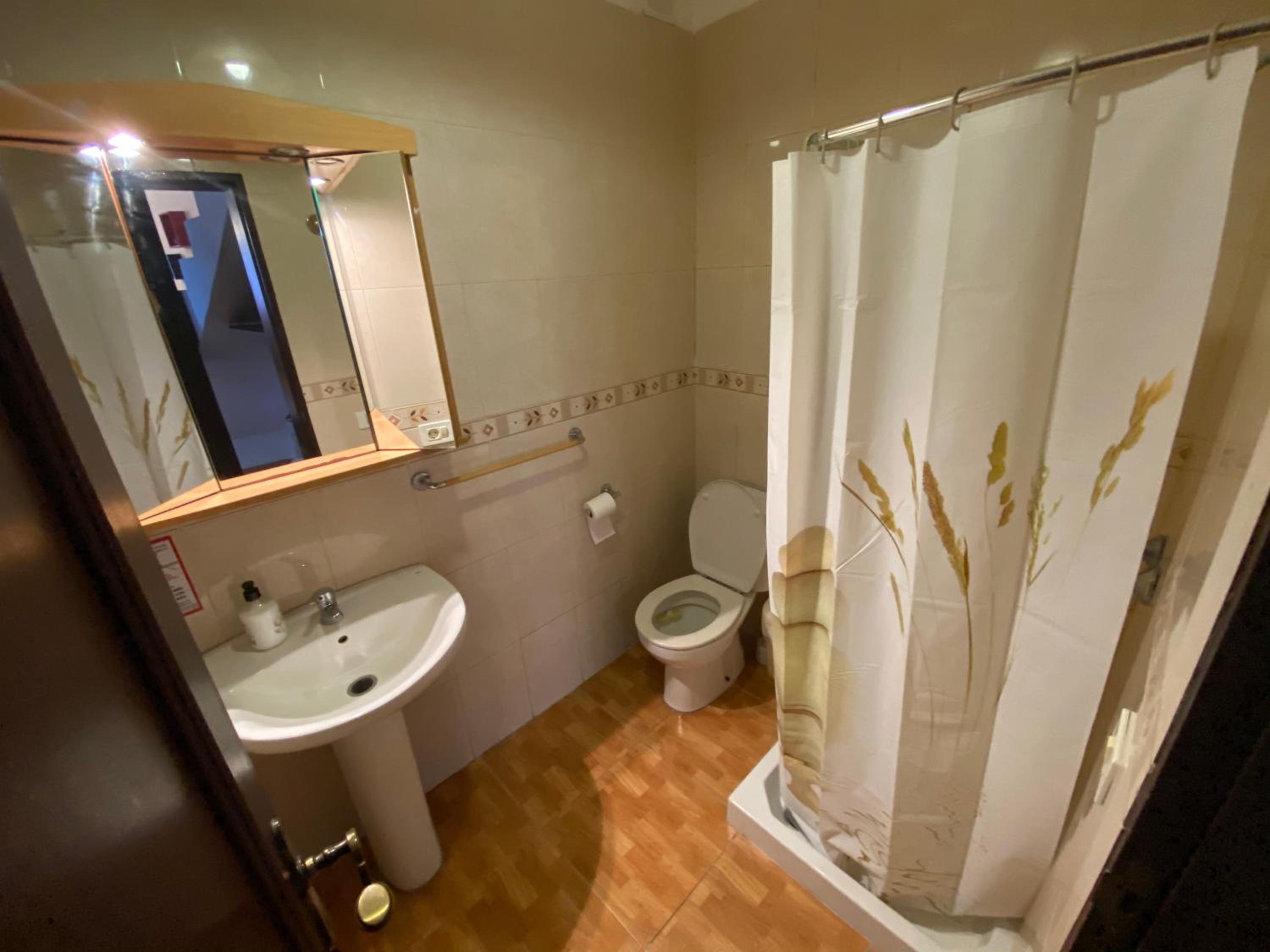 Three-Bedroom House - Photo 24