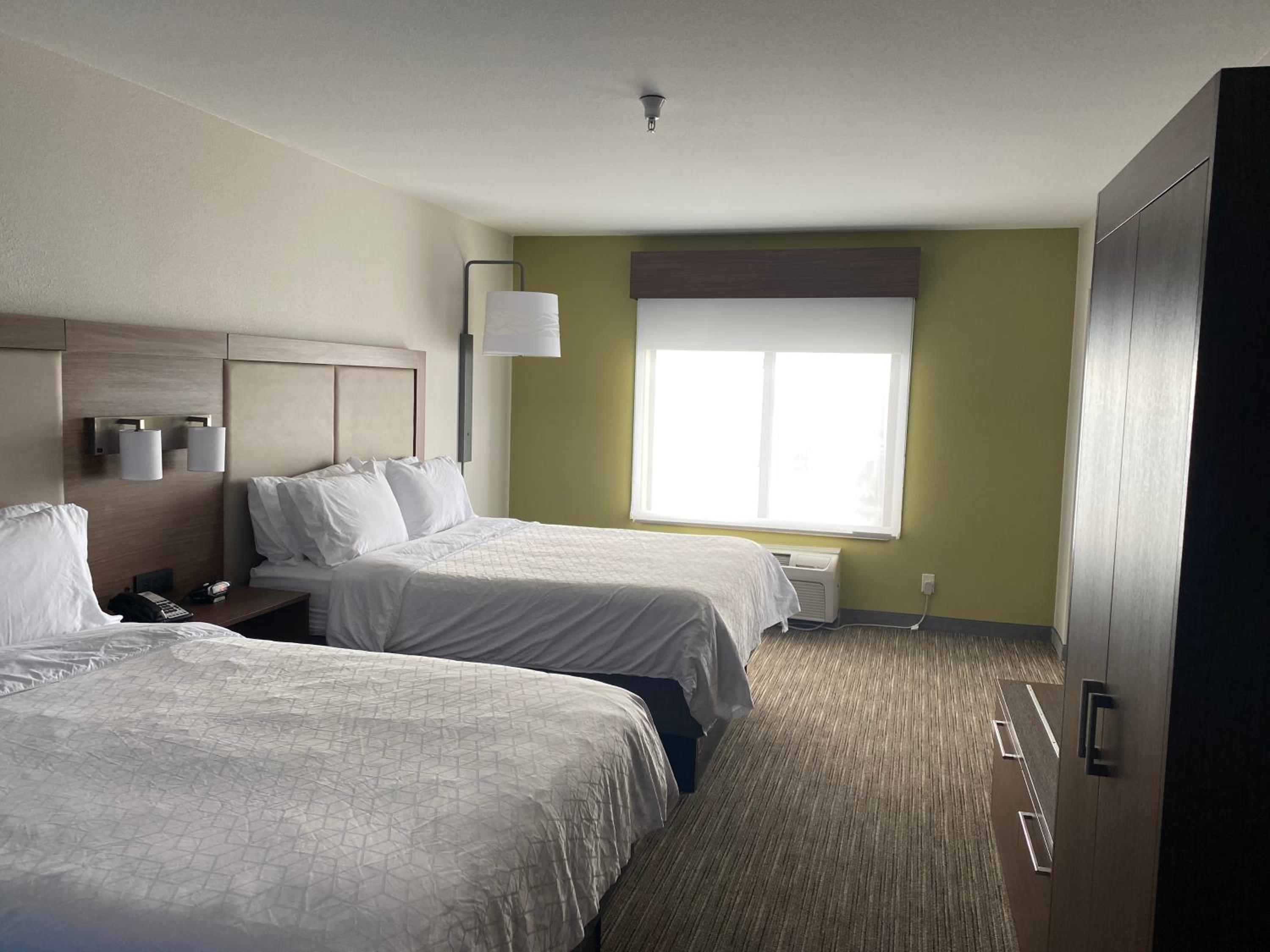 Queen Suite with Two Queen Beds and Sofa Bed - Photo 1