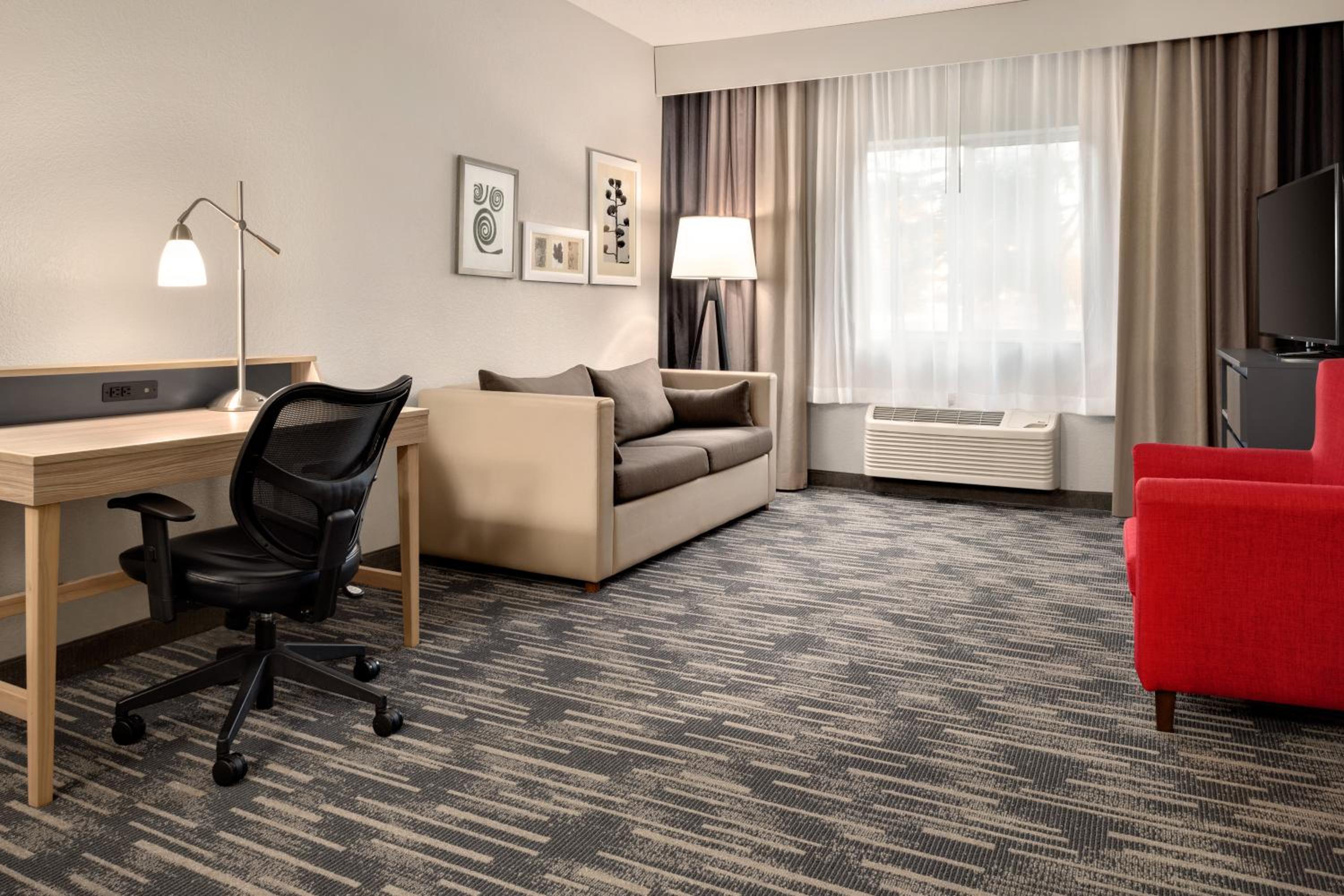 Extended Stay Two-Bedroom Suite with One King and Two Queen Beds - Kitchenette/Non-Smoking - Photo 3