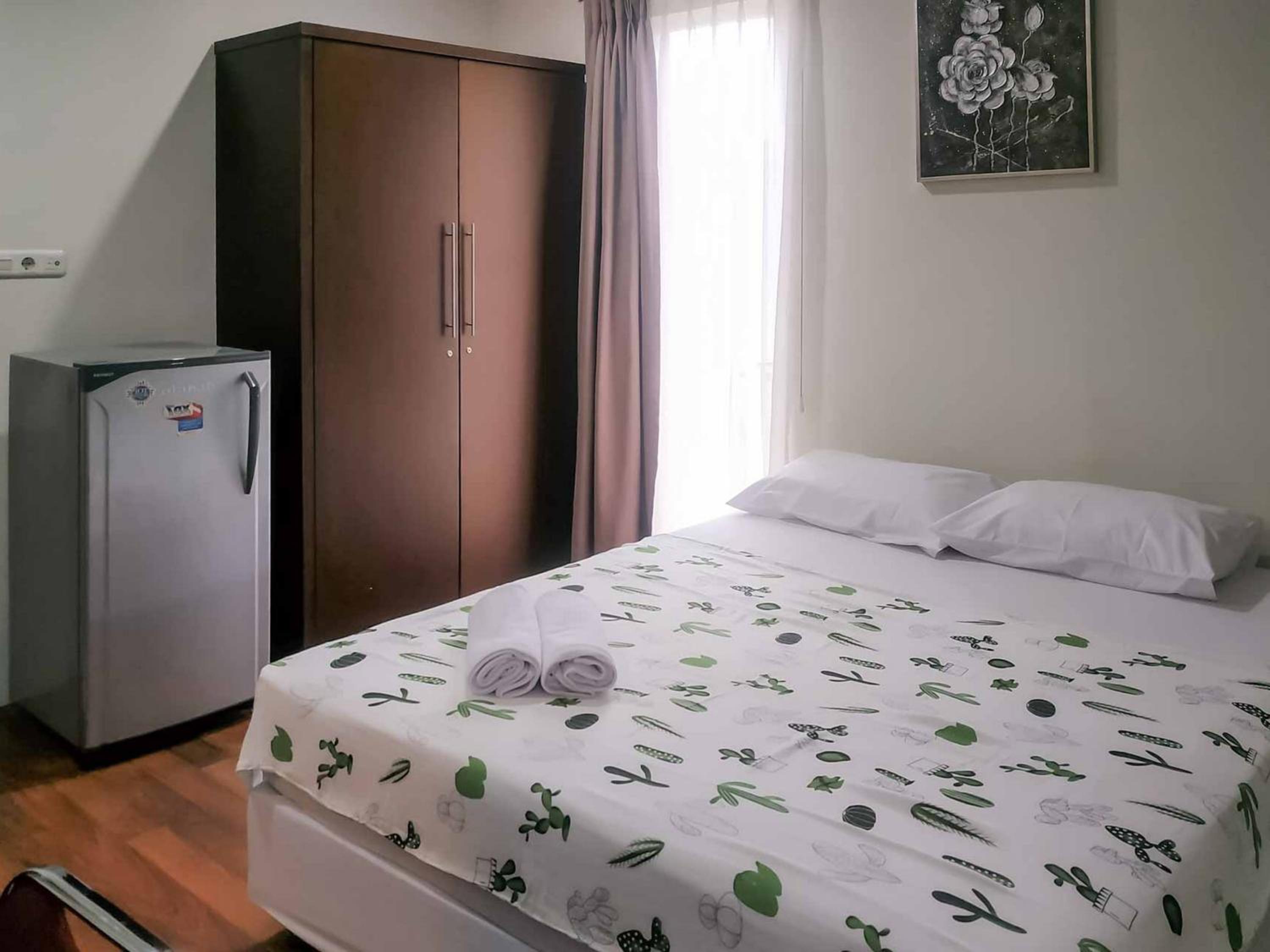 Deluxe Room - Photo 14