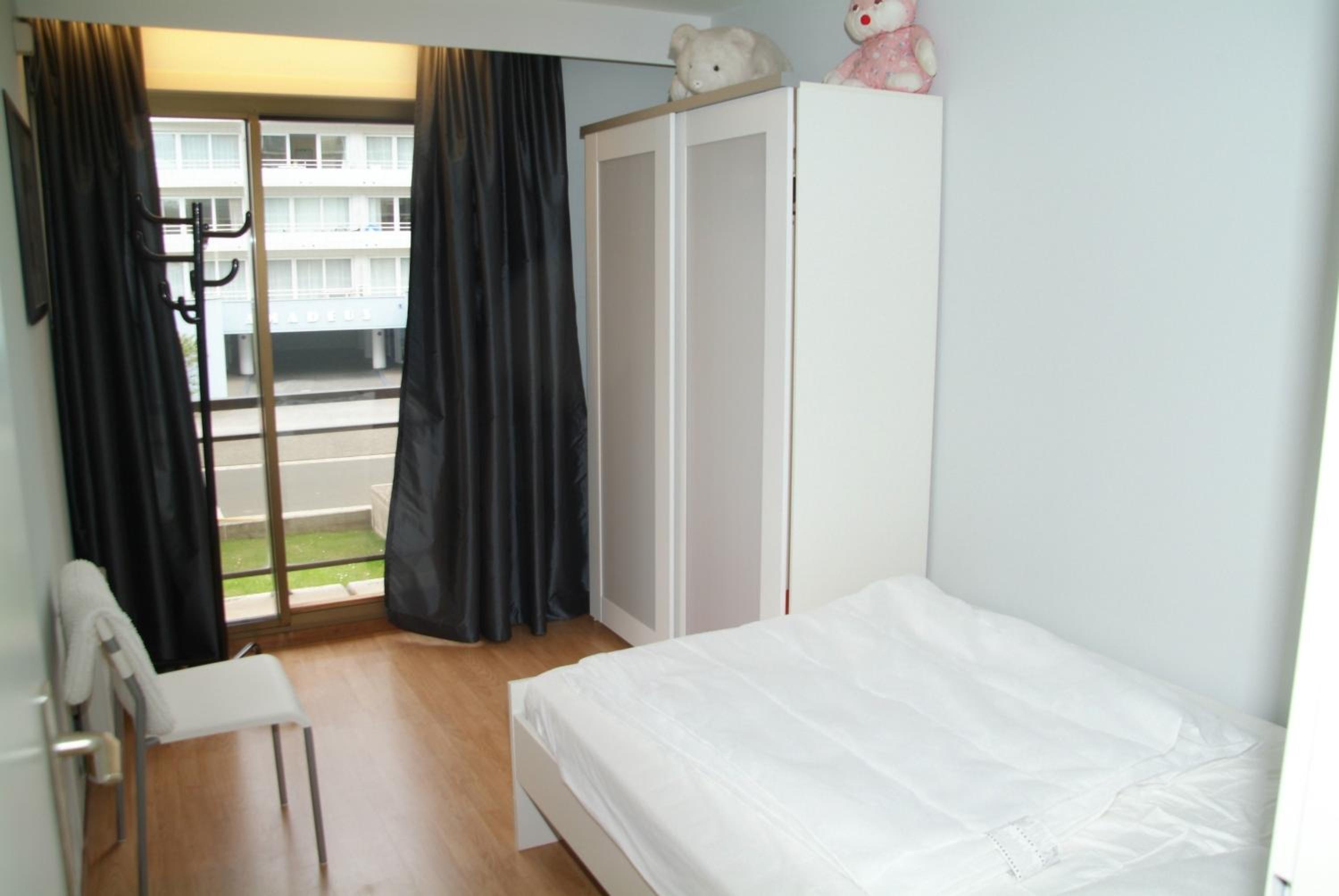 Two-Bedroom Apartment - Photo 18
