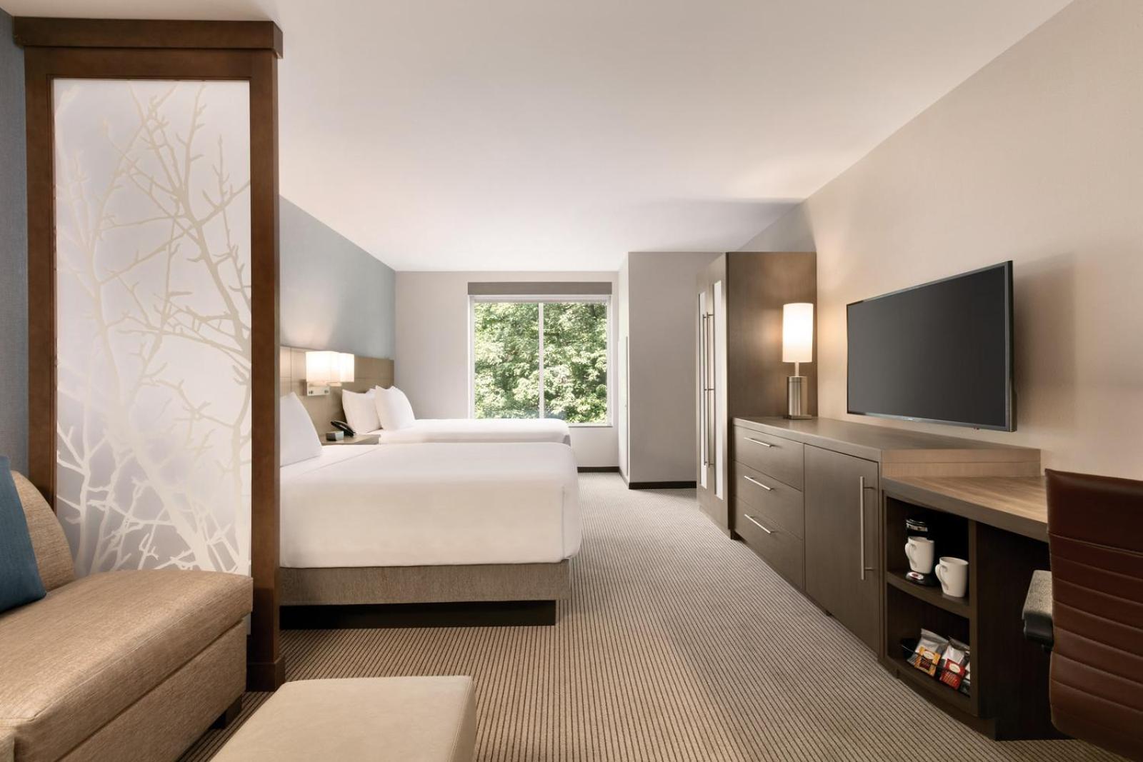 Queen Room with Two Queen Beds and Sofa Bed - Photo 1