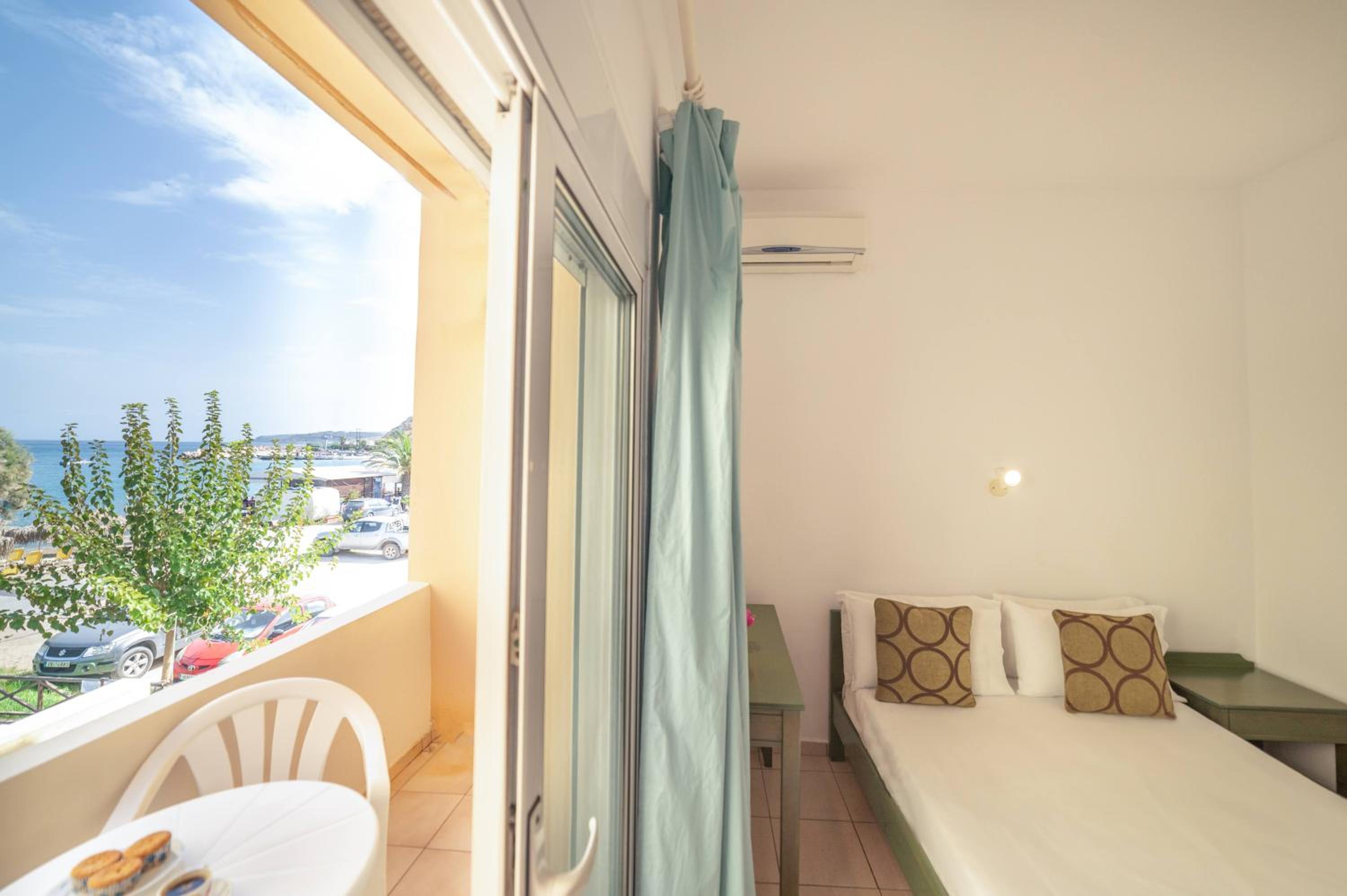 Standard Triple Room with Side Sea View