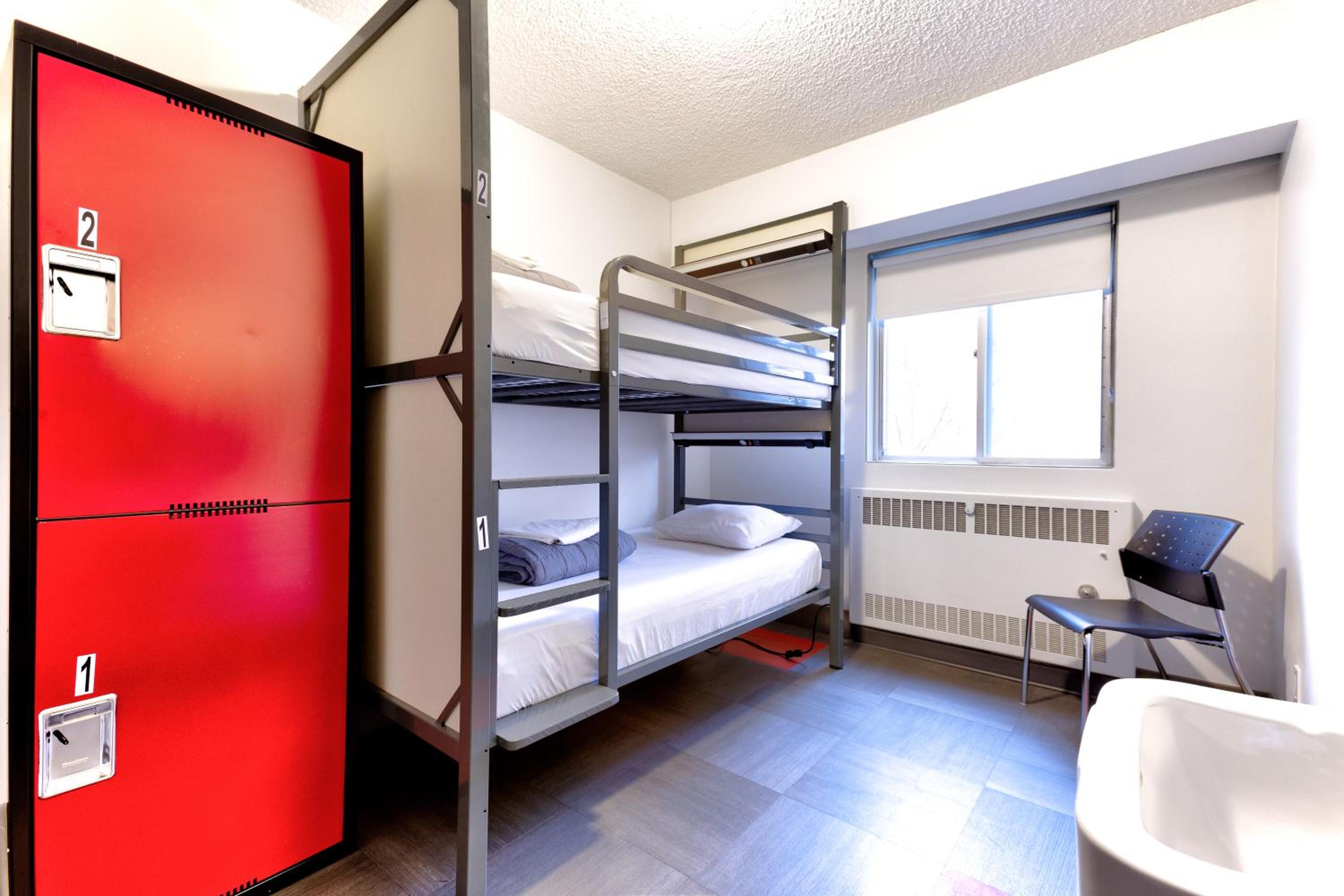 Single Bed in a Male Dormitory Room with Two Beds
