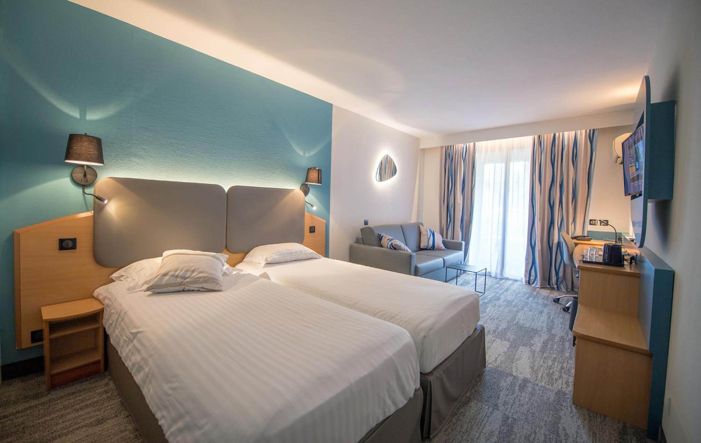 Triple Room (3 Adults or 2 Adults + 1 Child)