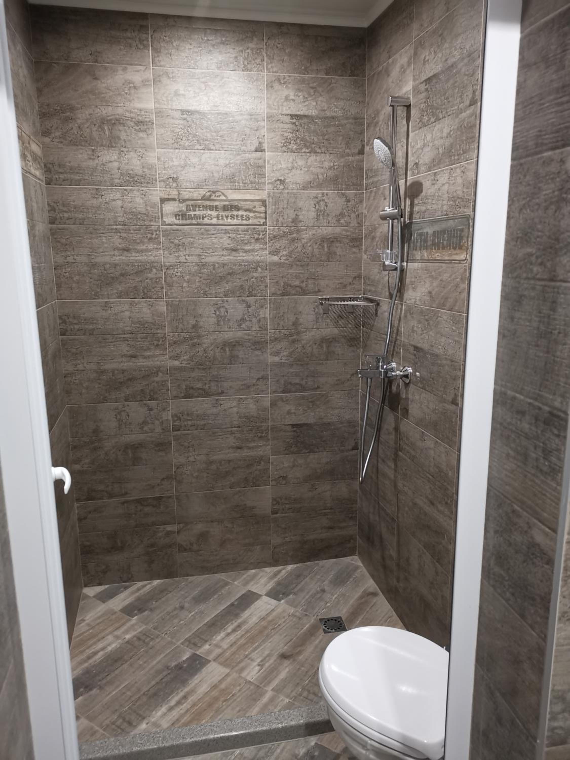 Three-Bedroom Apartment - Photo 48
