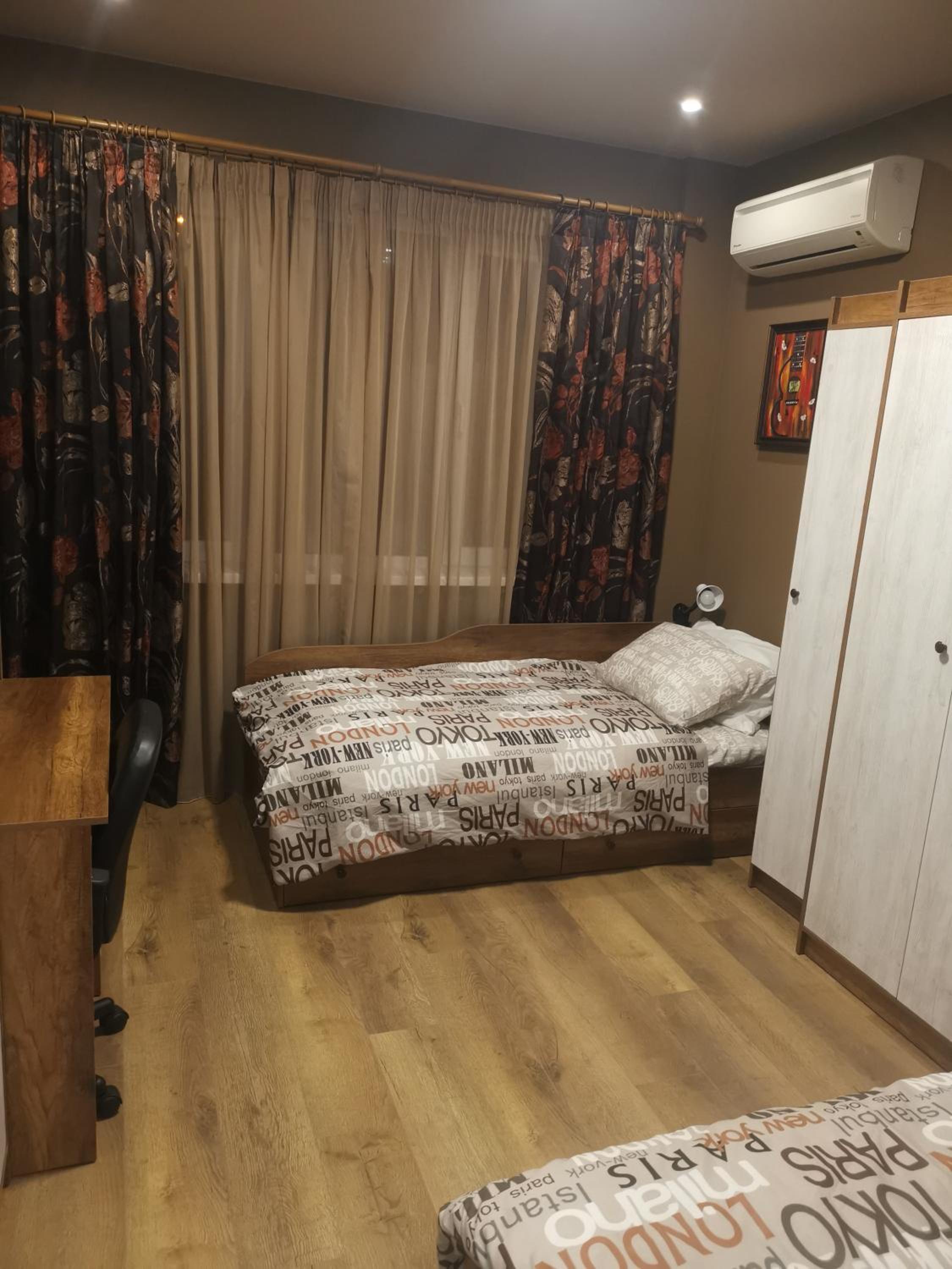 Three-Bedroom Apartment - Photo 2