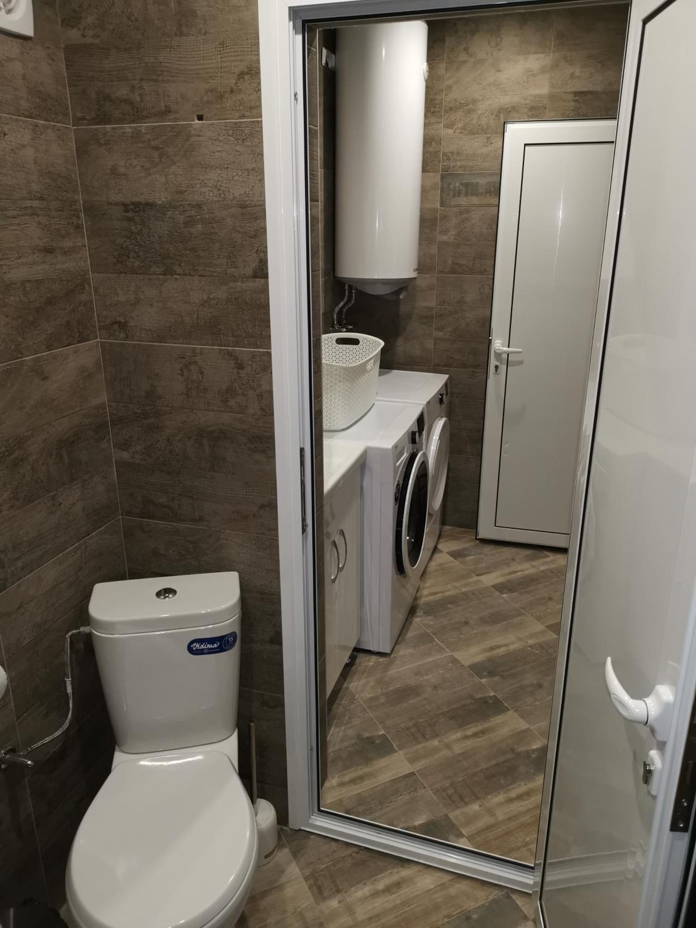Three-Bedroom Apartment - Photo 10