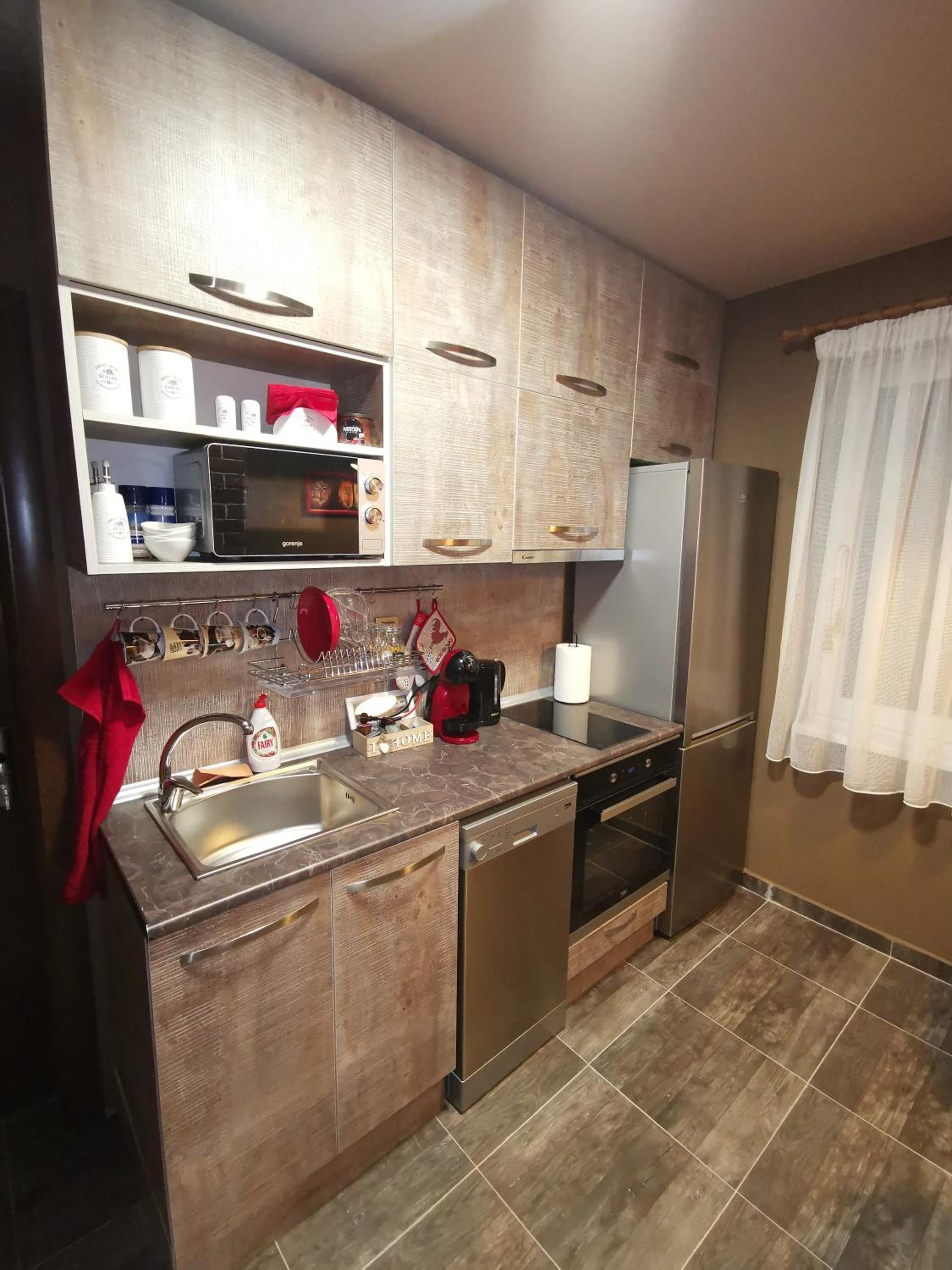 Three-Bedroom Apartment - Photo 32