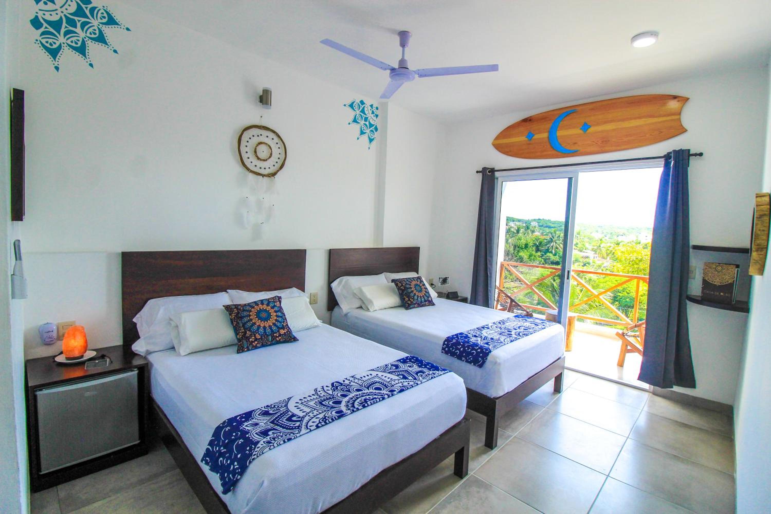 Quadruple Room with Balcony - Photo 1