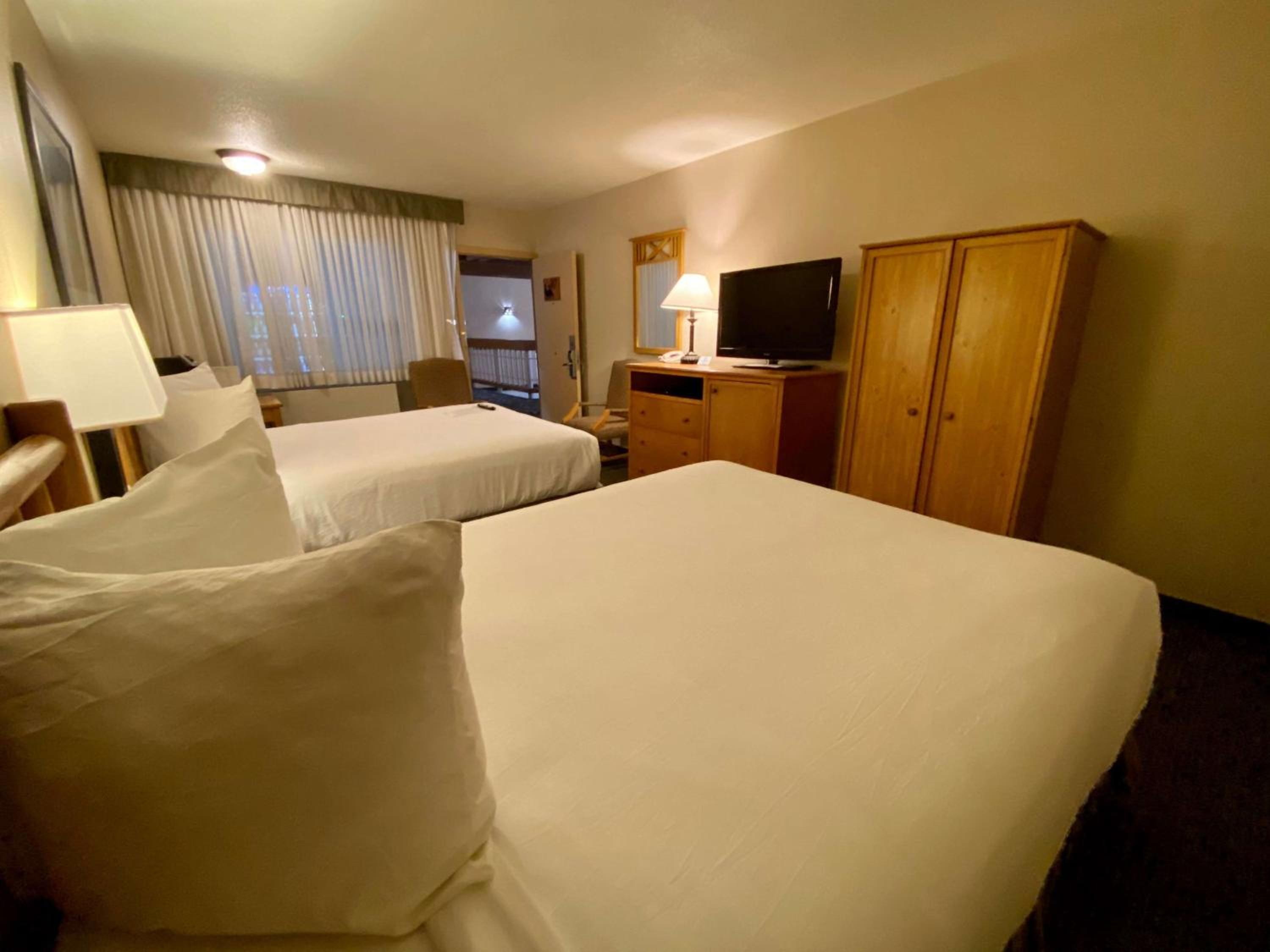 Queen Room with Two Queen Beds - Photo 1