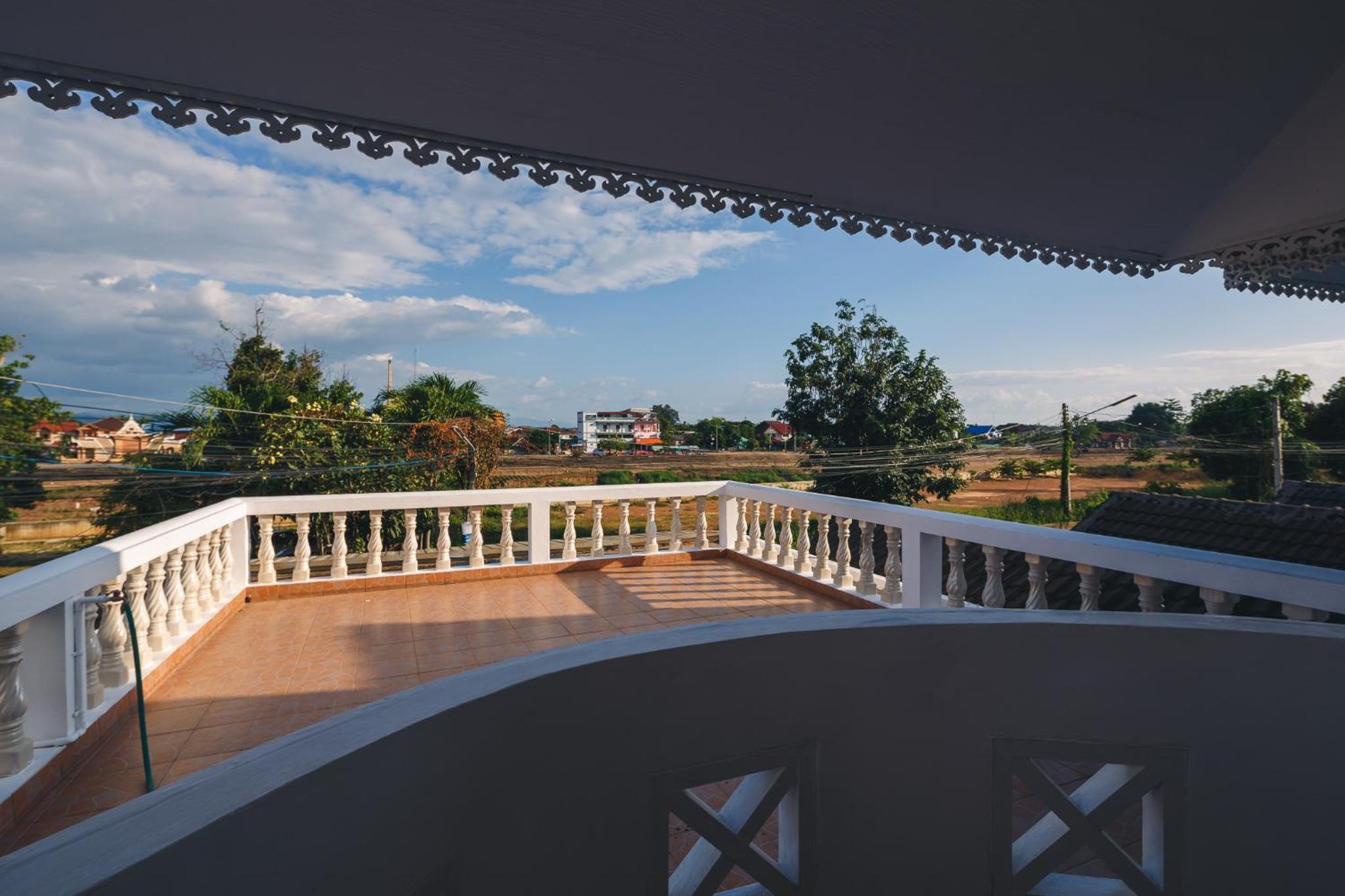 Family Room with Balcony - Photo 2