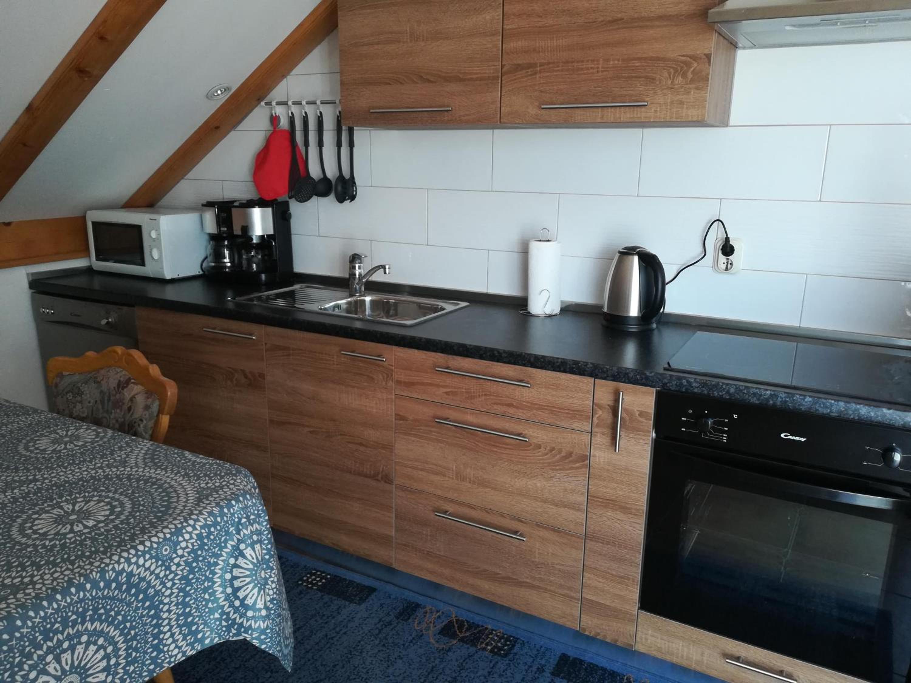 Three-Bedroom Apartment - Photo 11