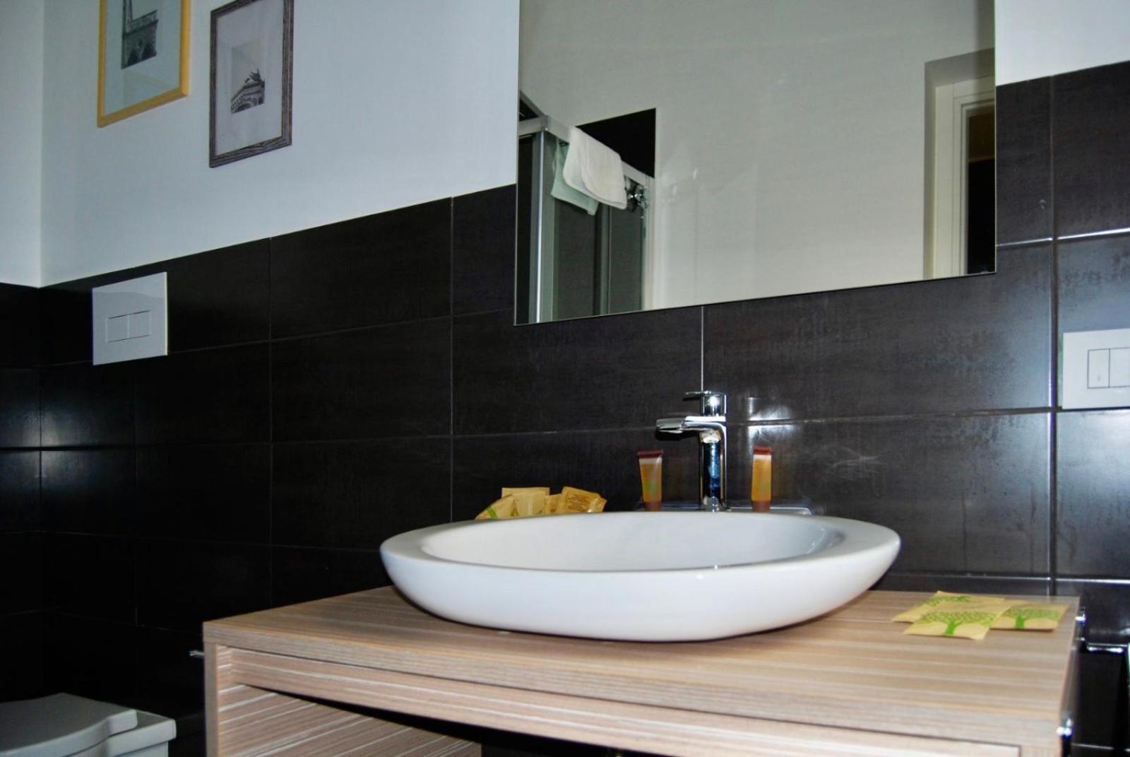 Deluxe Quadruple Room - Photo 4