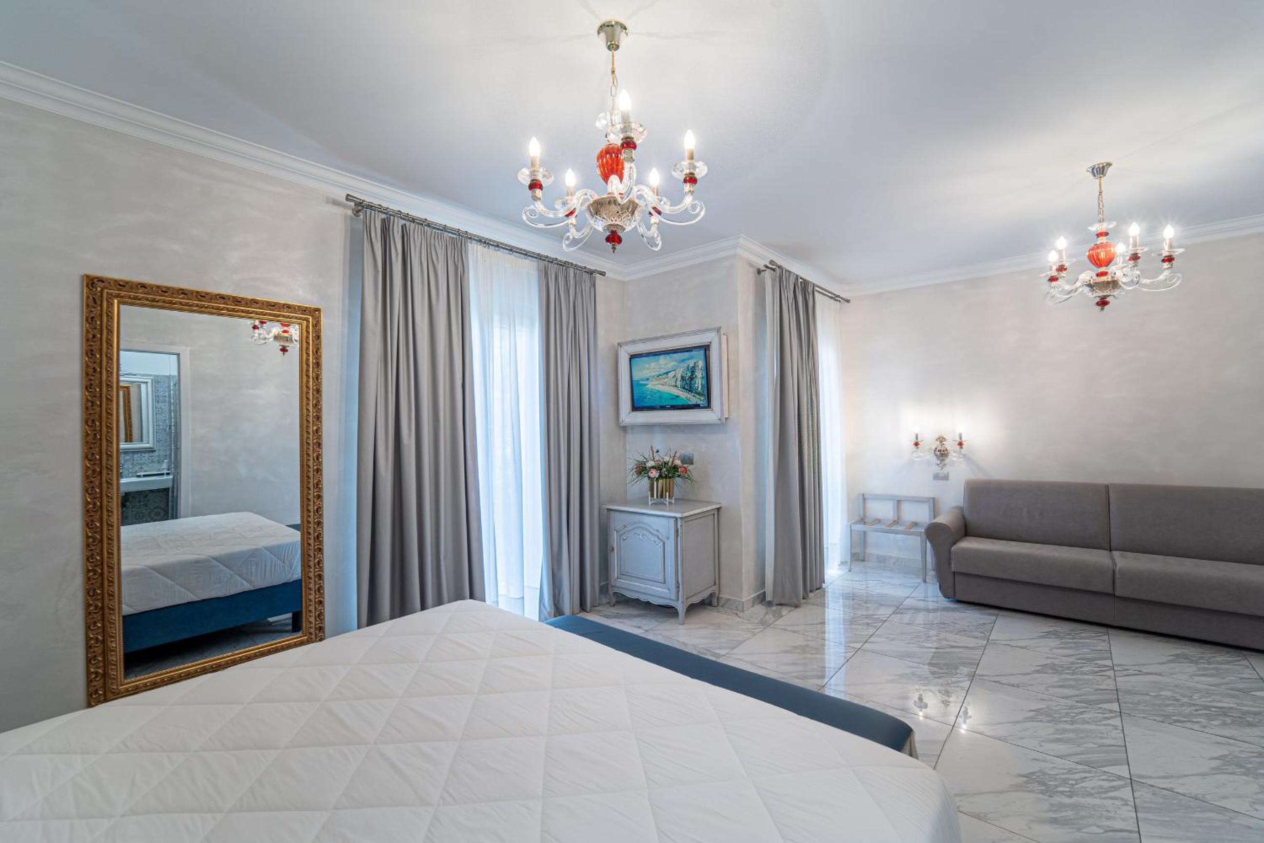 Deluxe Quadruple Room with Balcony photo 2