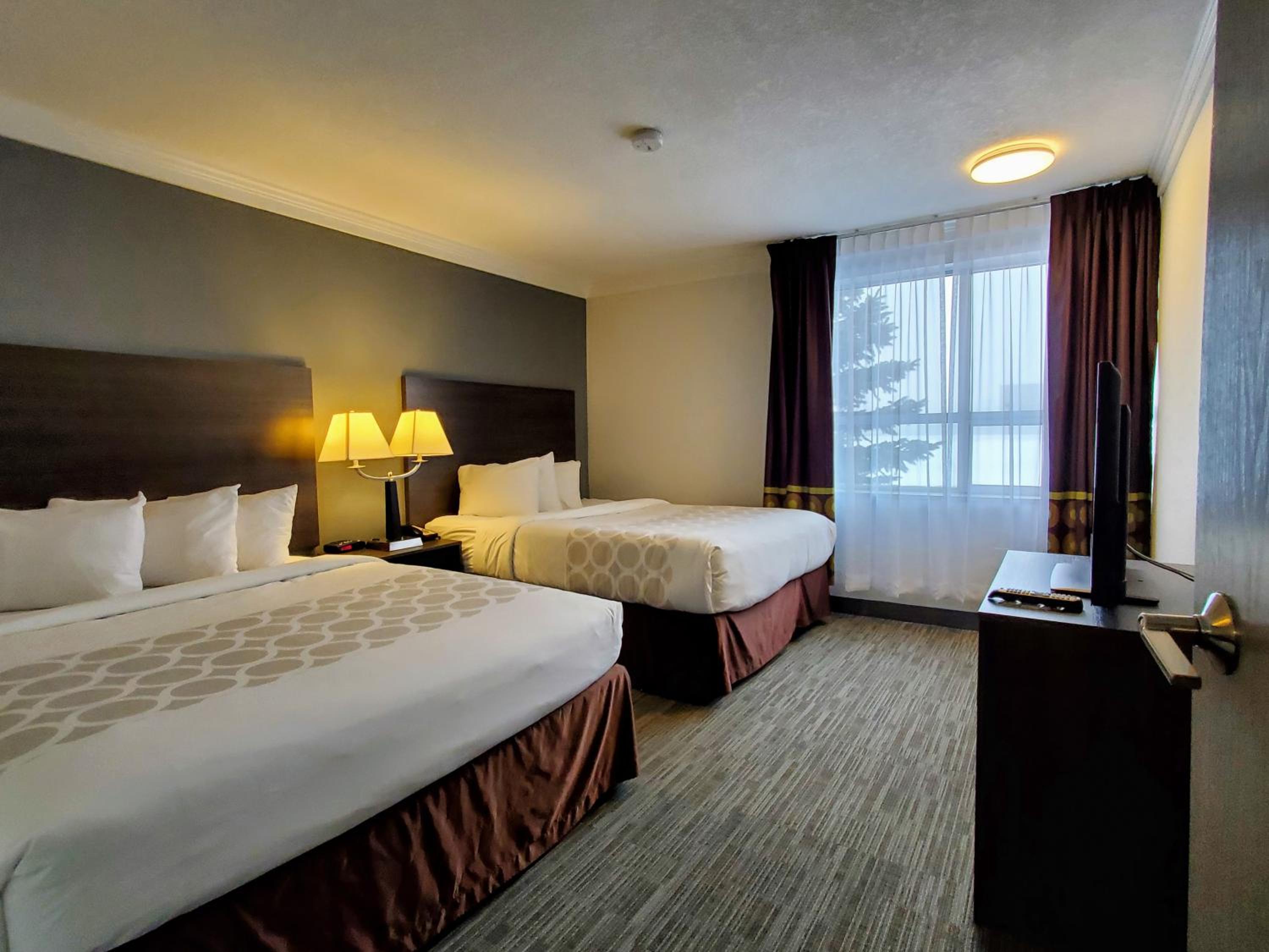 Pacific Suite with Two Queen Beds and Kitchen - Non-Smoking - Photo 1