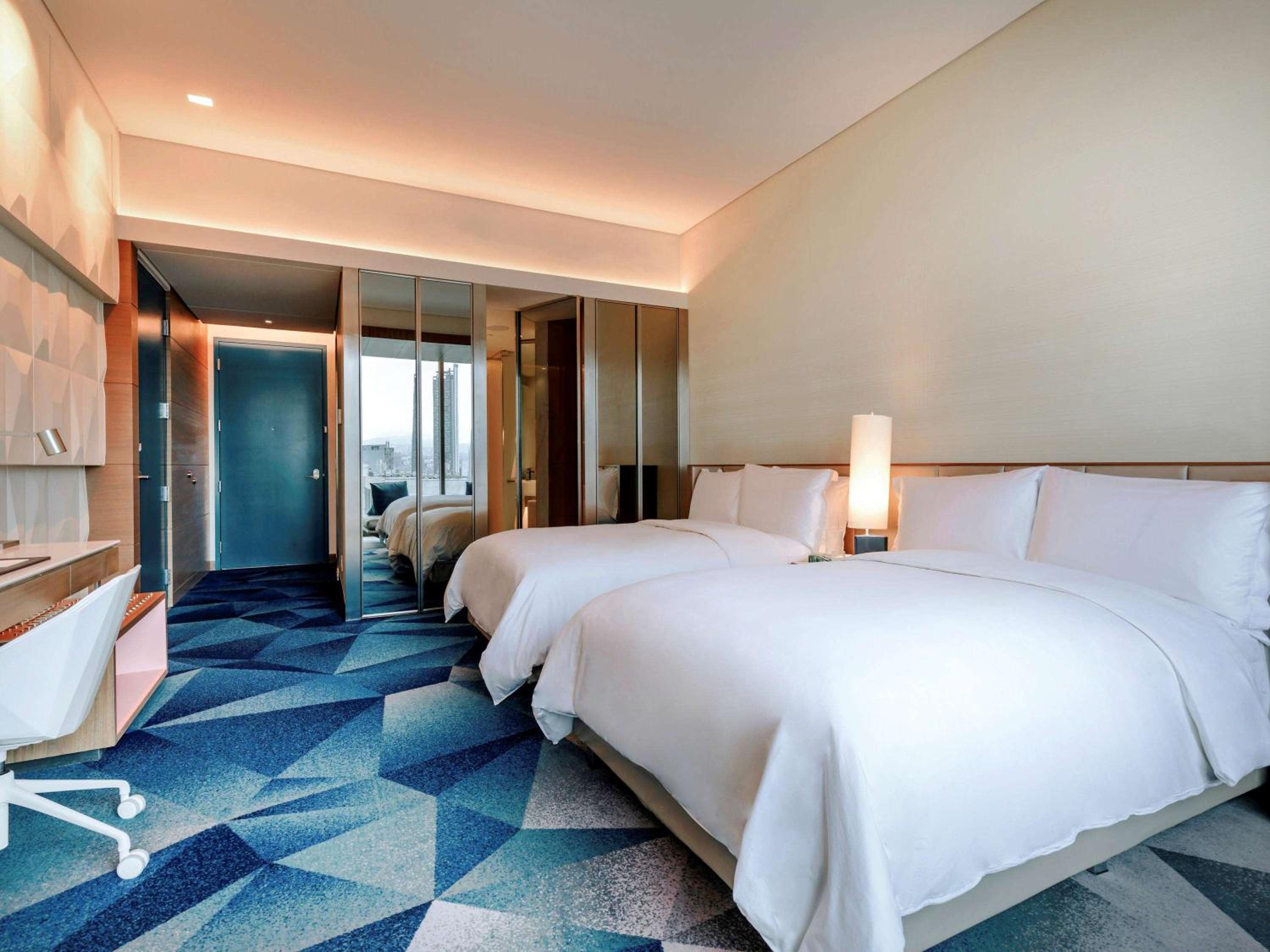 Junior Suite with Two Double Beds and Skyline View