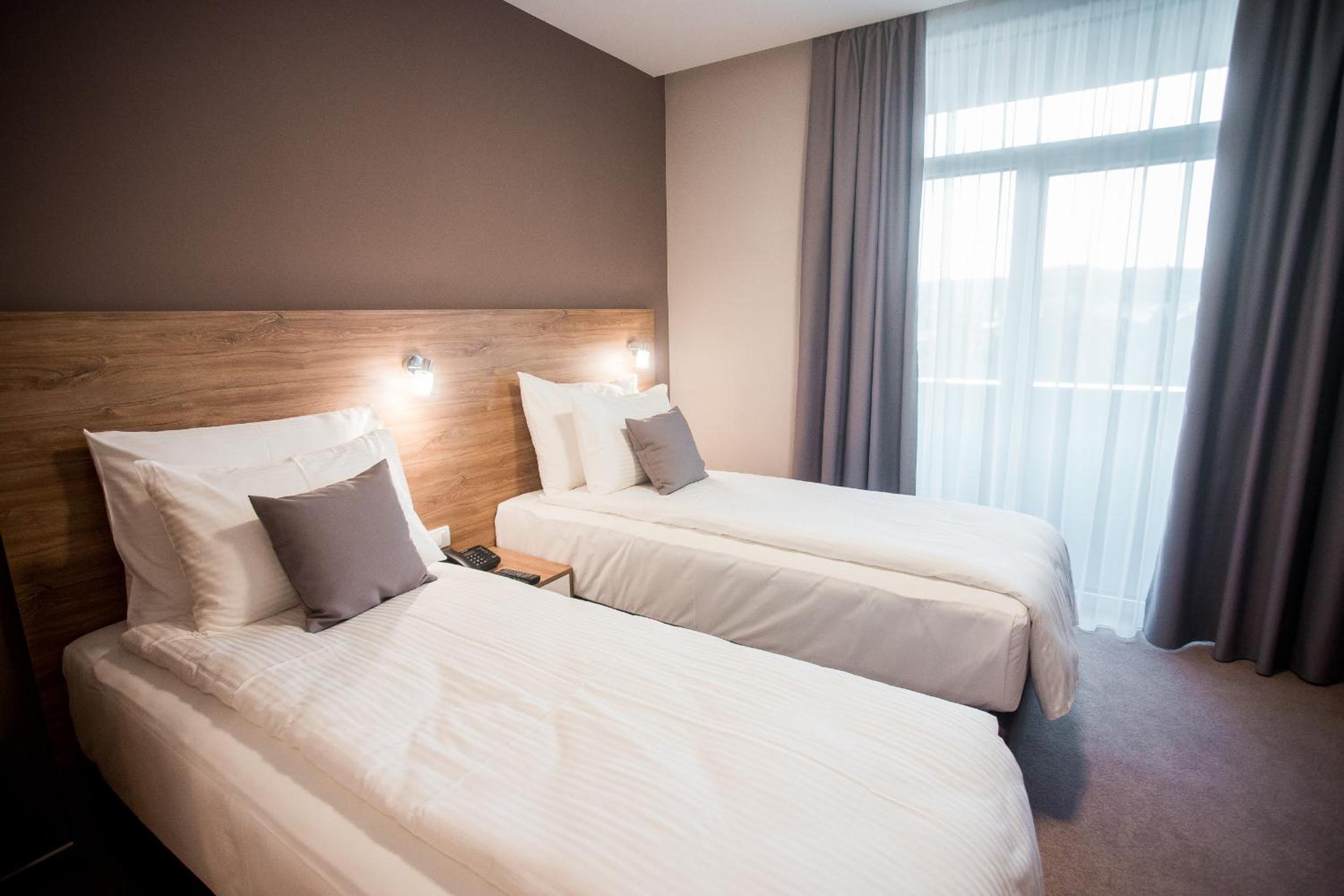 Twin Room with Balcony - Photo 1