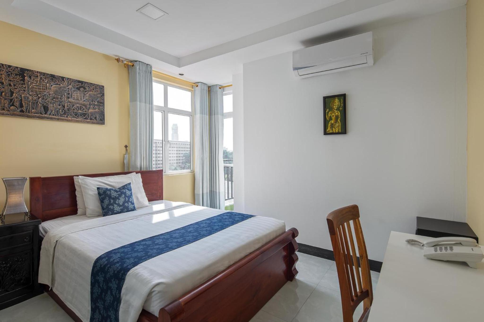 Standard Double Room with Balcony City View - Photo 1