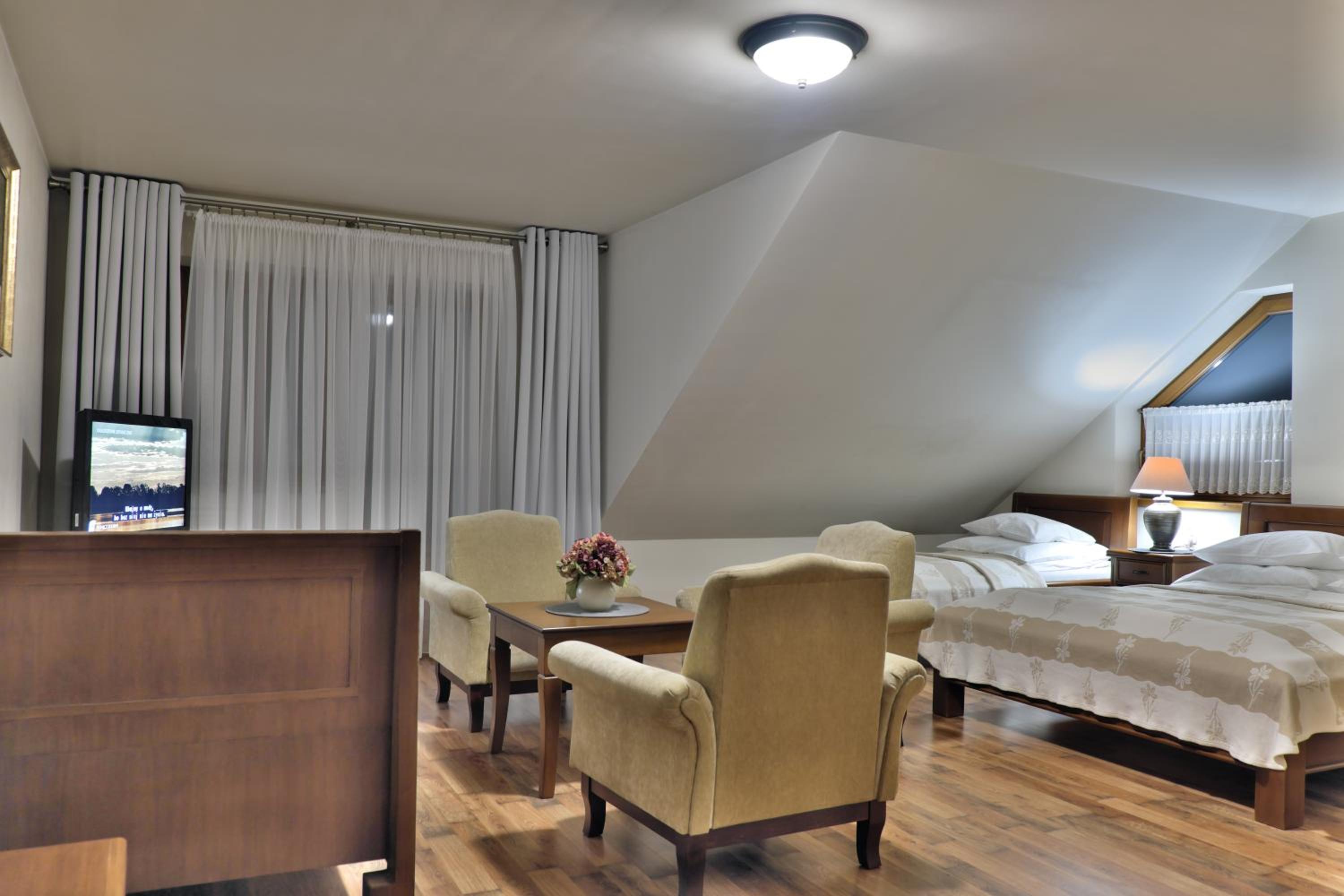 Quadruple Room with Balcony - Photo 1