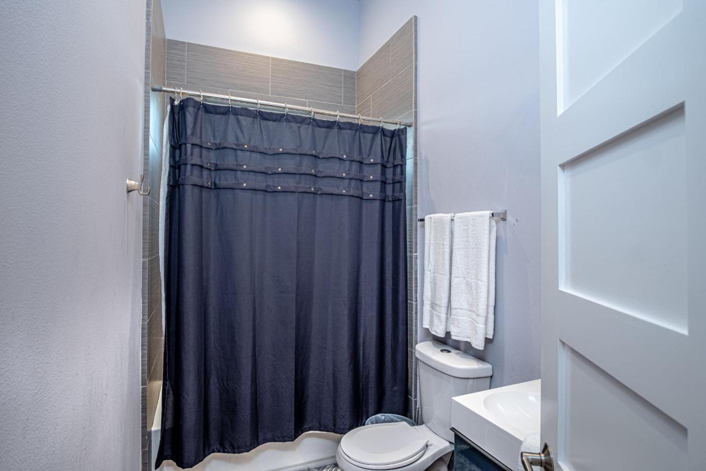 Three-Bedroom House - Photo 12
