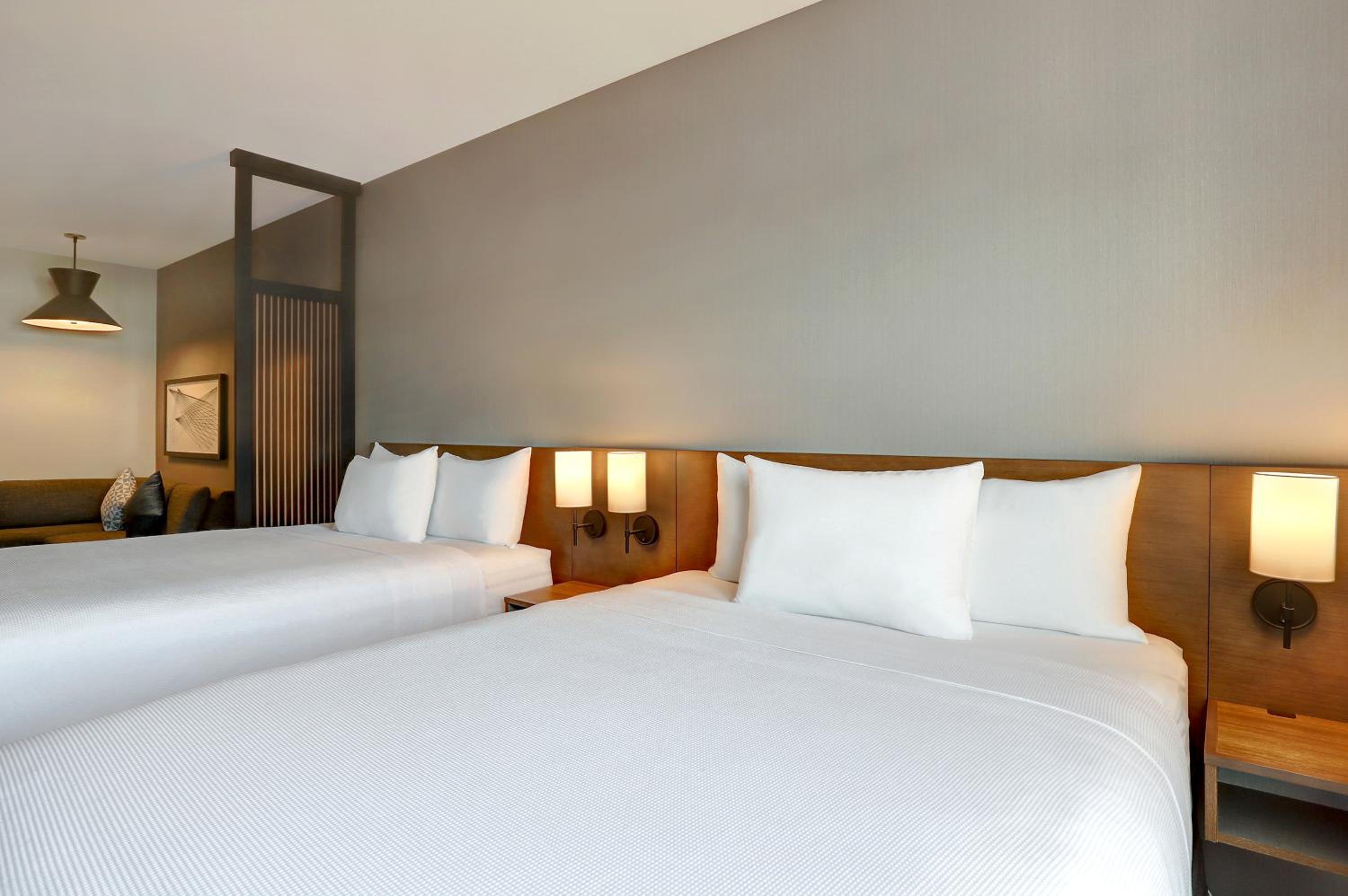 Queen Room with Two Queen Beds and Sofa Bed - Photo 1