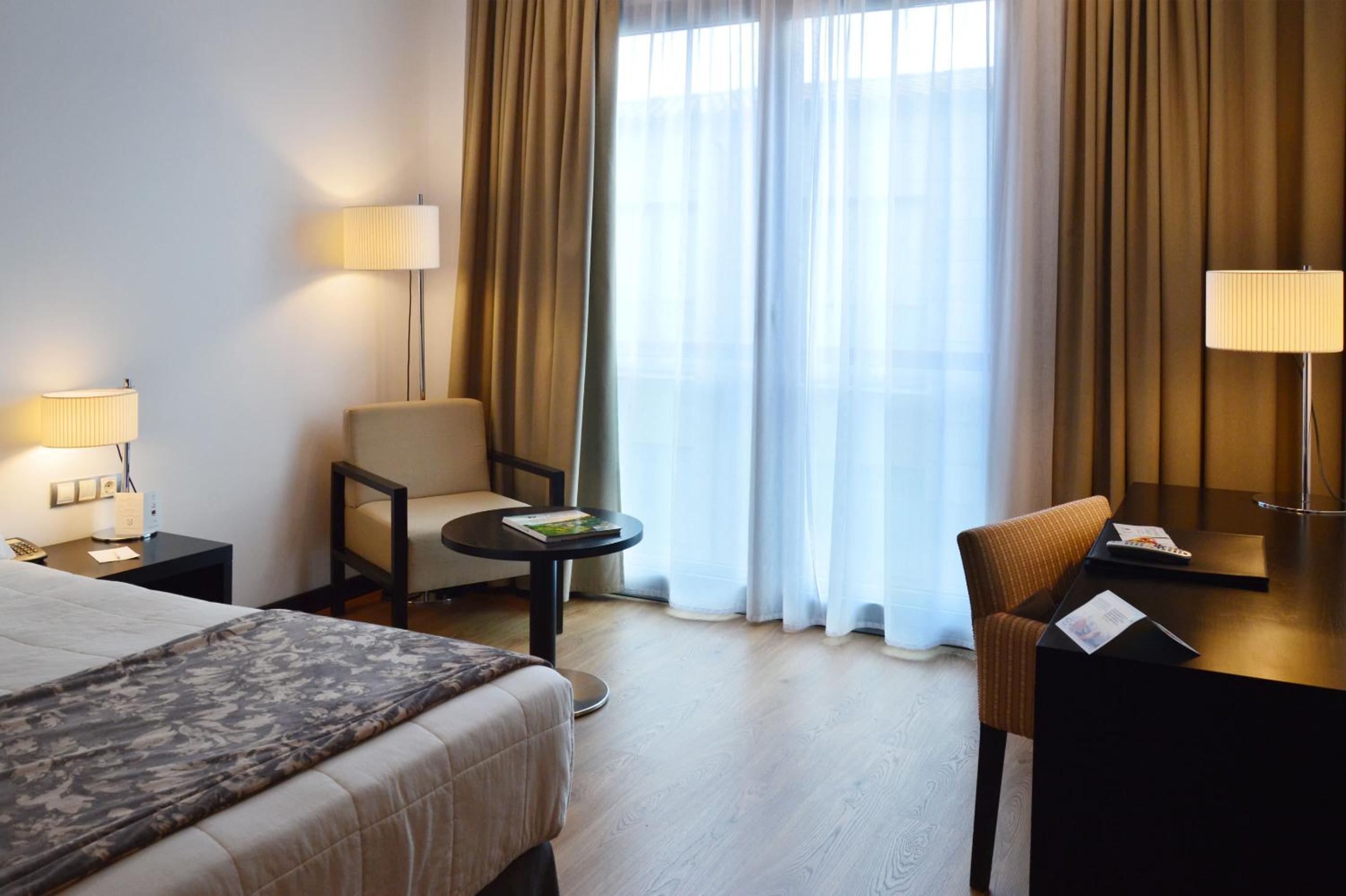 Basic Double Room - Single Use - Photo 1