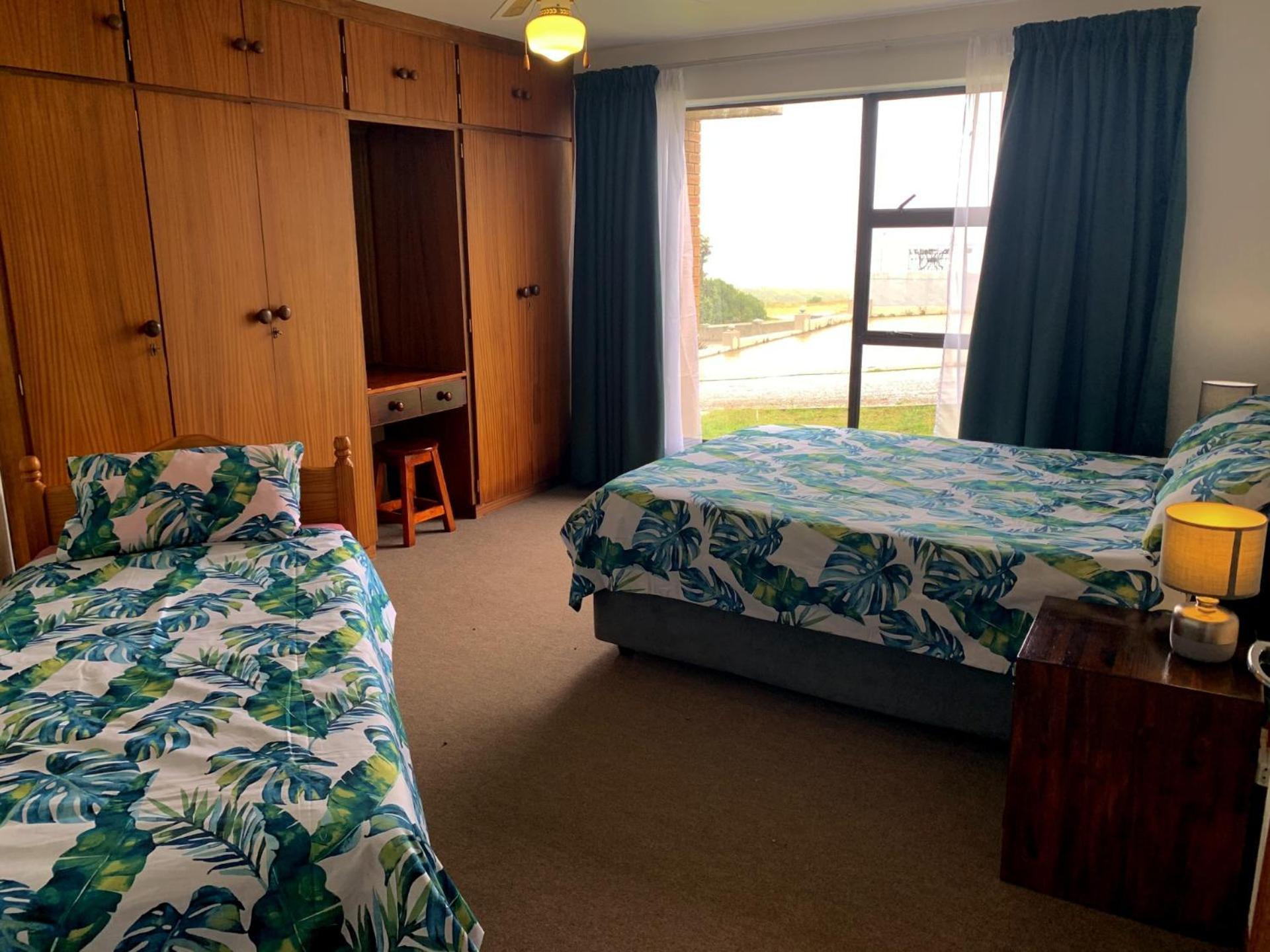 Three-Bedroom House - Photo 17