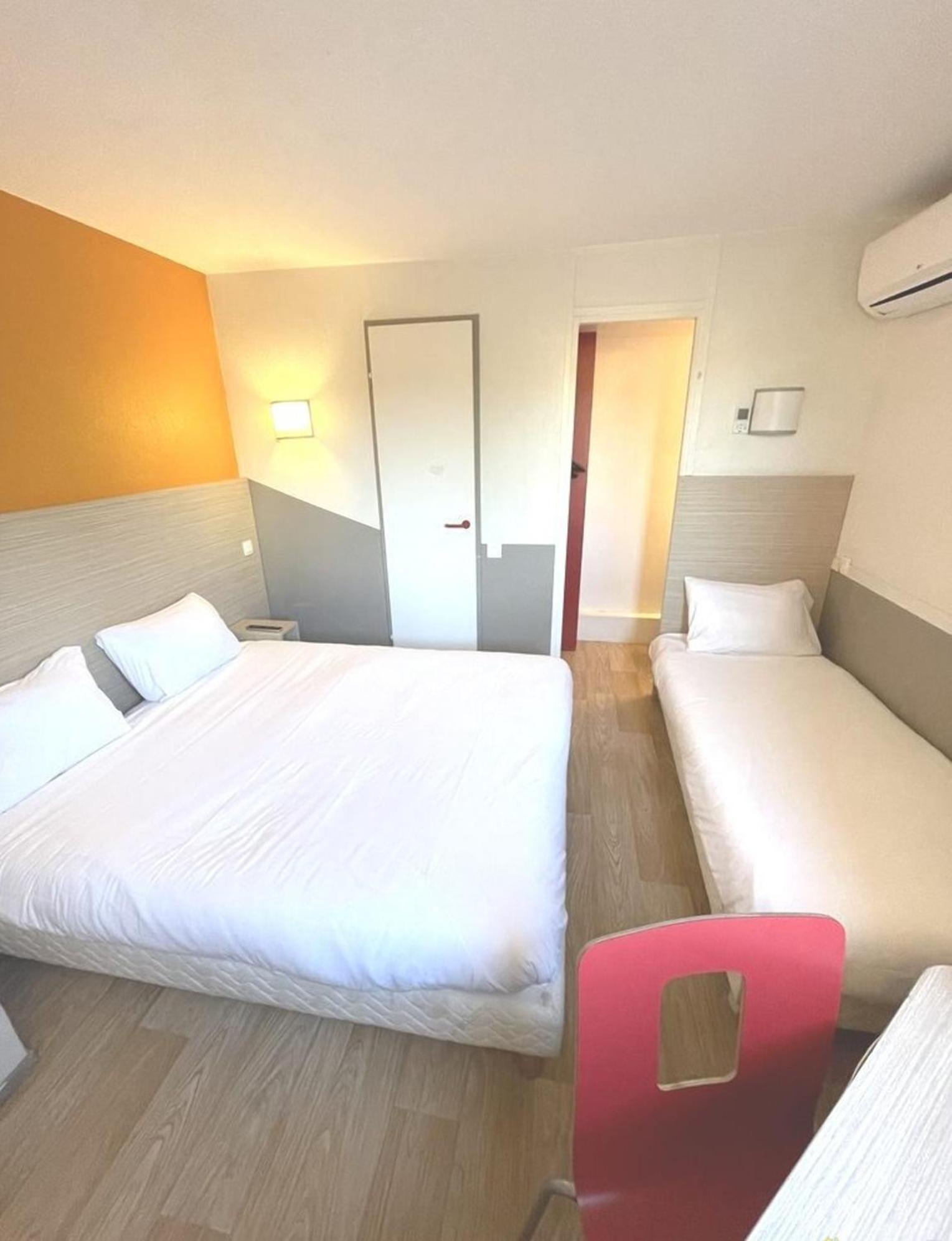Triple Room (1 Double Bed + 1 Single Bed)