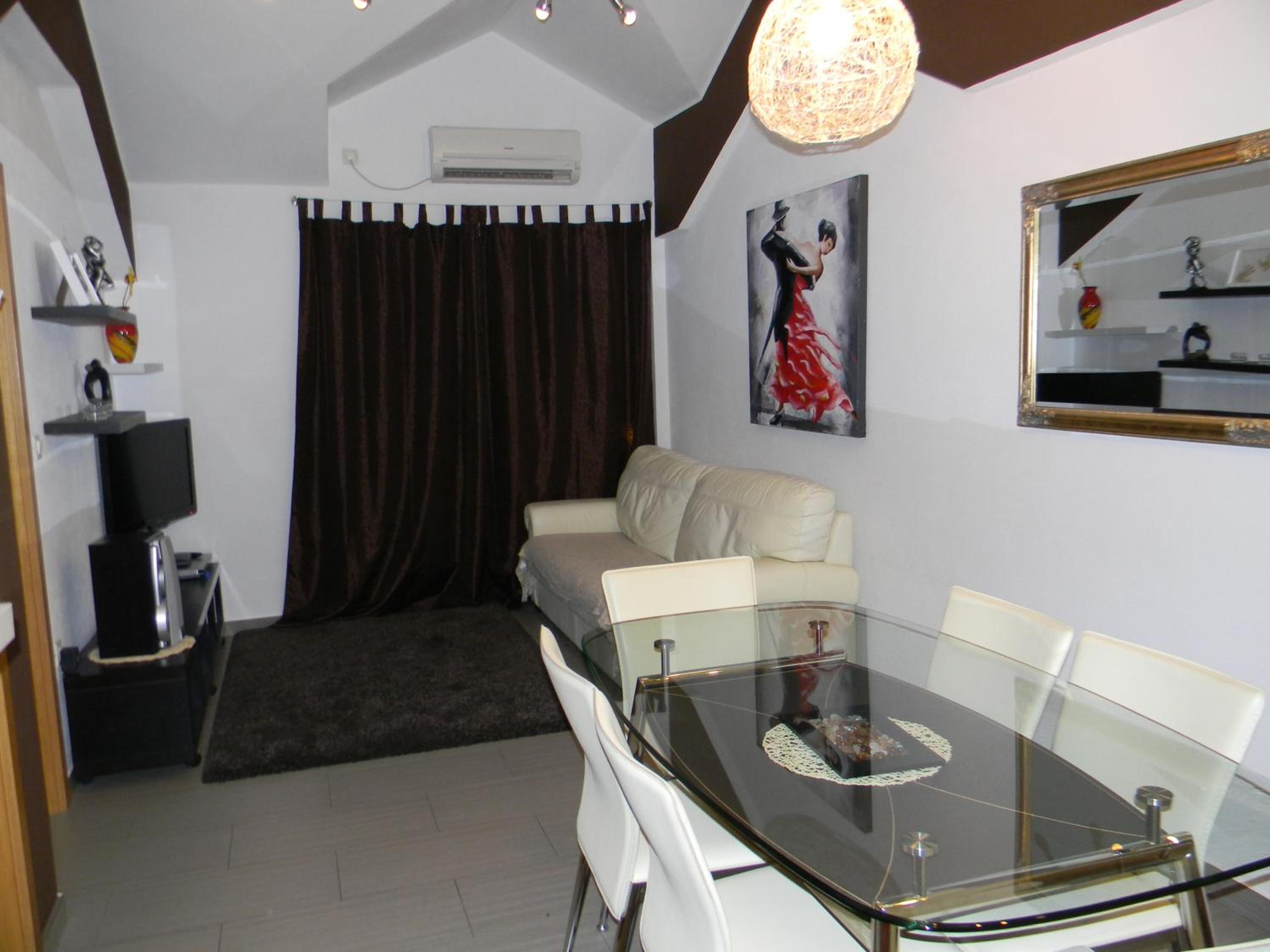 One-Bedroom Apartment with Balcony and Sea View