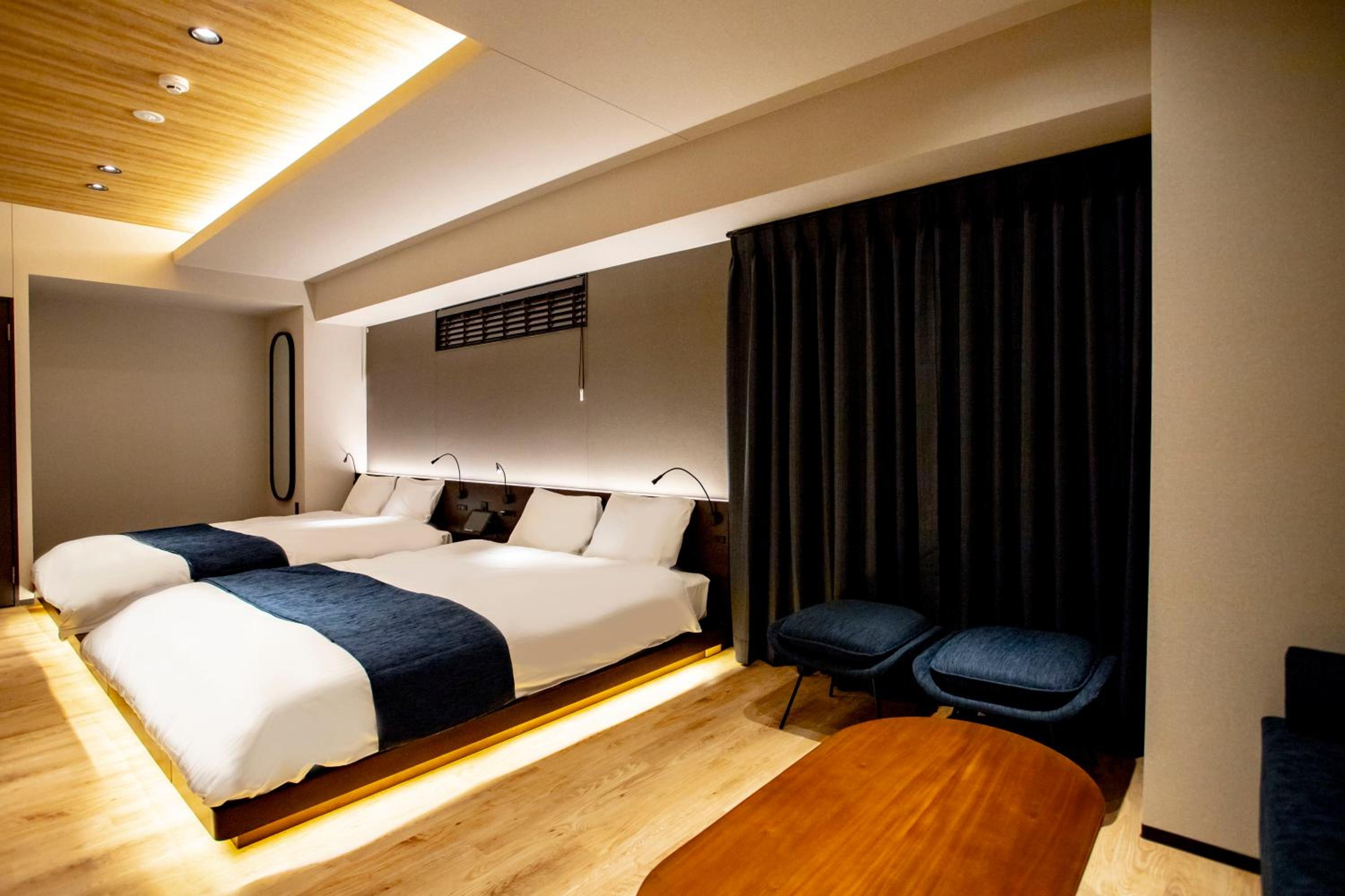 Queen Room with Two Queen Beds - Photo 1