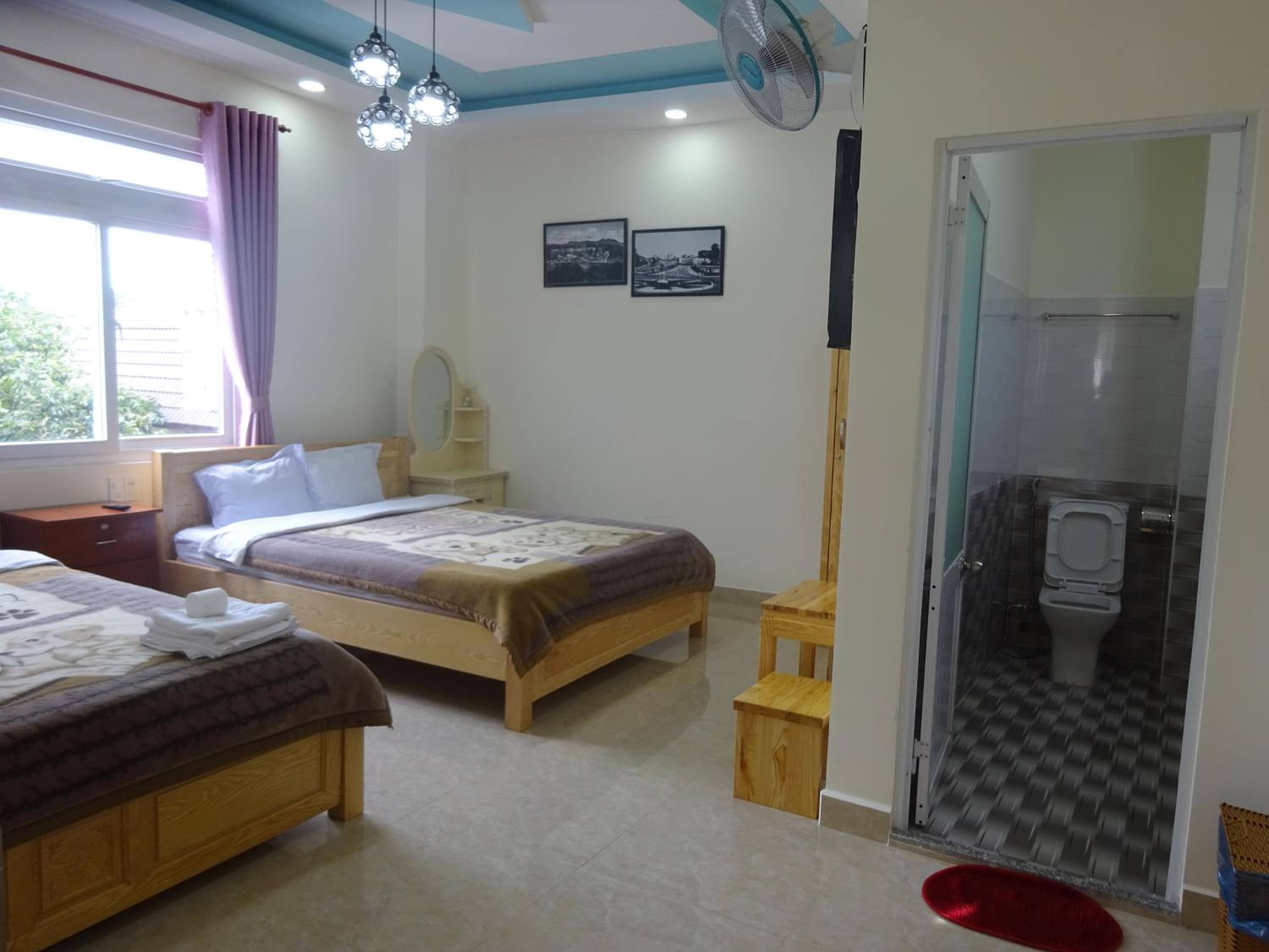 Deluxe Quadruple Room - Photo 11