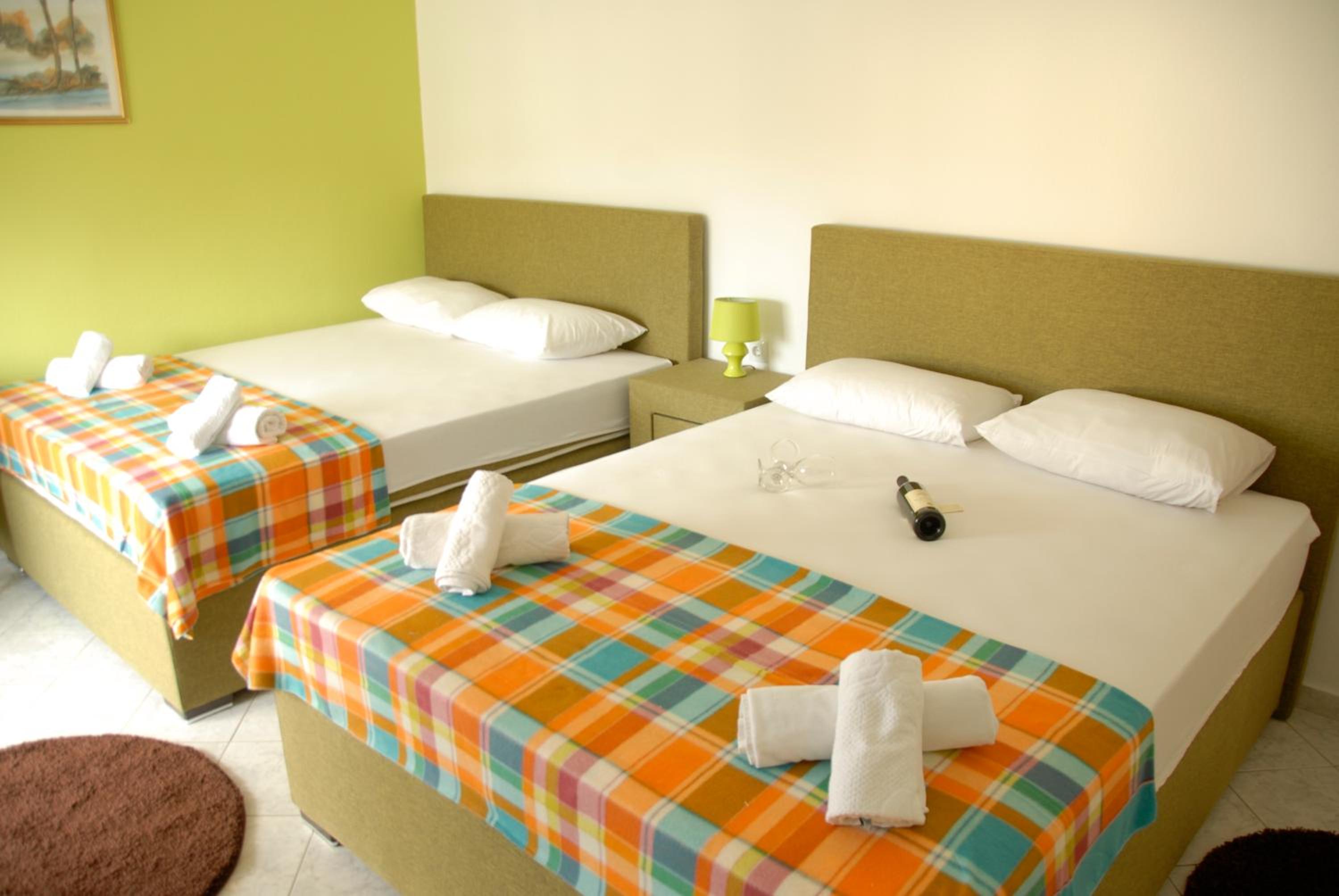 Comfort Quadruple Room with Balcony and Garden View