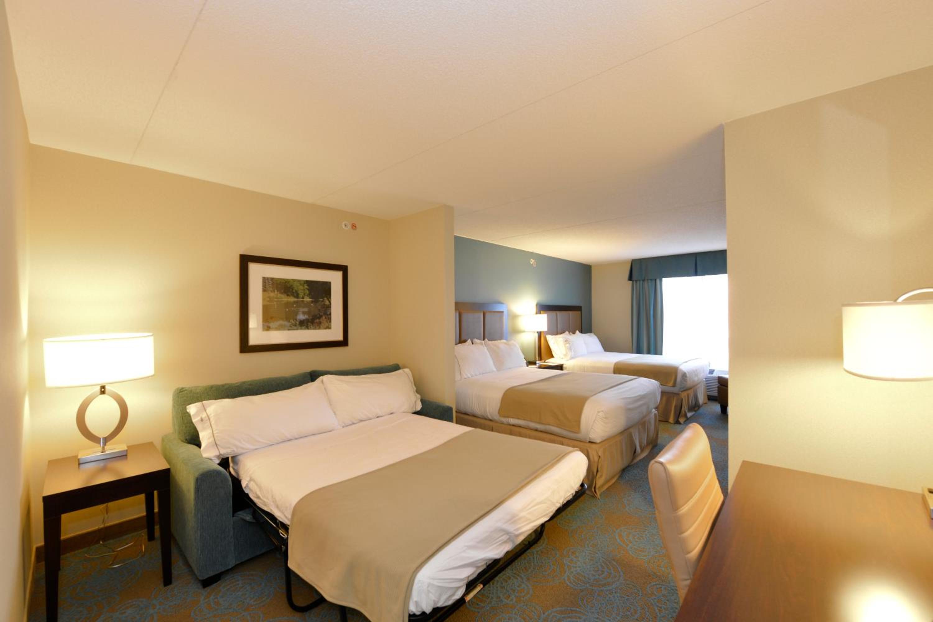 Queen Suite with Two Queen Beds and Sofa Bed