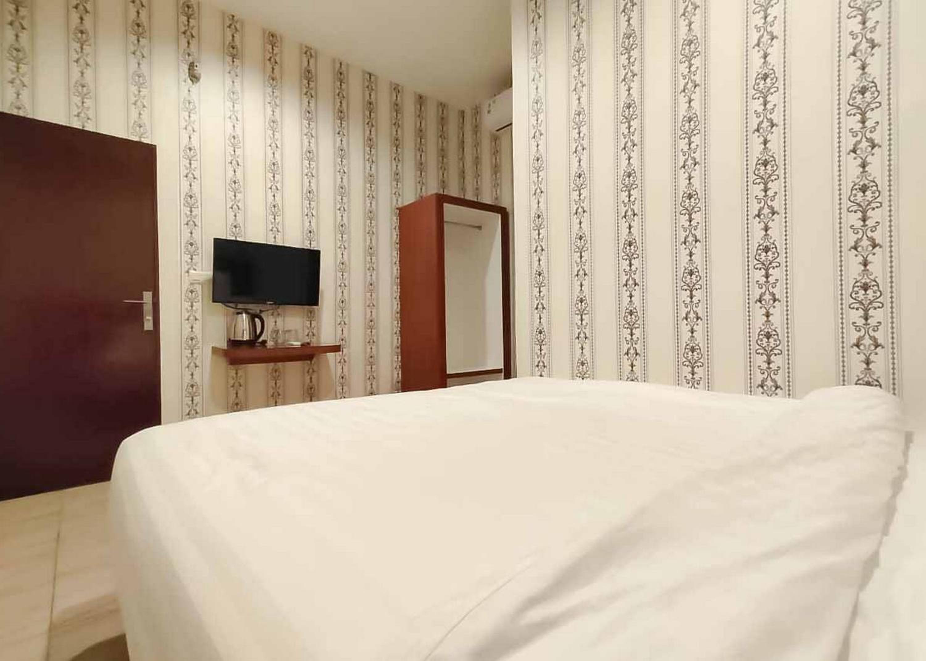 Deluxe Room - Photo 5