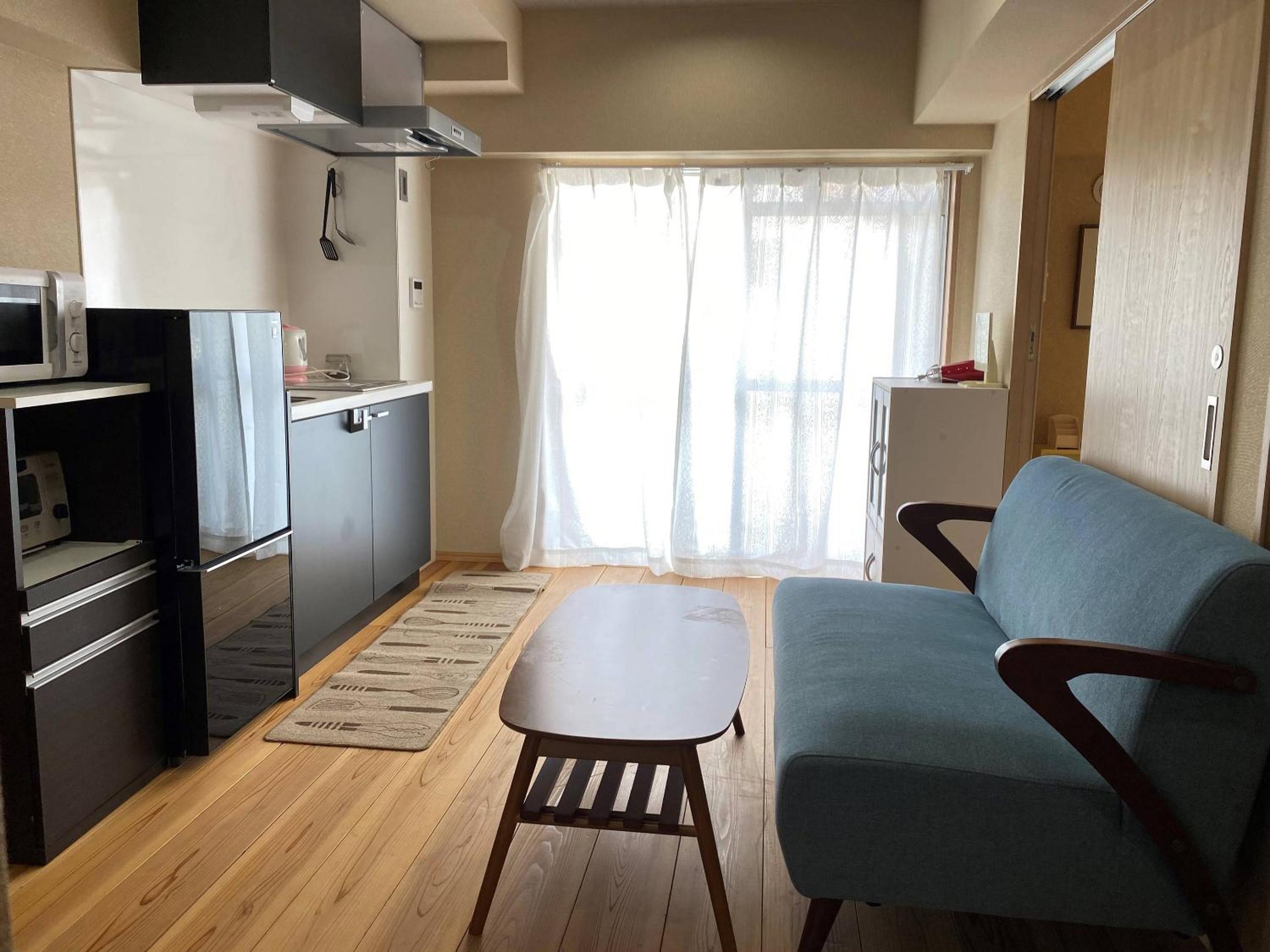 Apartment with Balcony - Photo 5