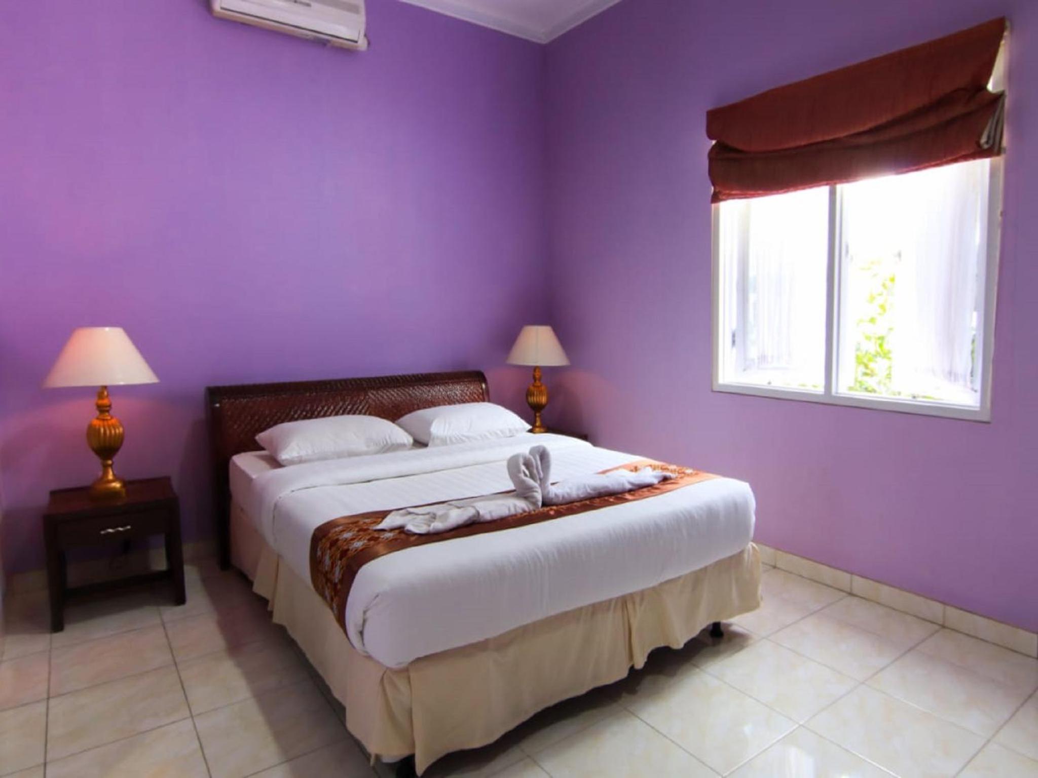 Deluxe Room - Photo 5
