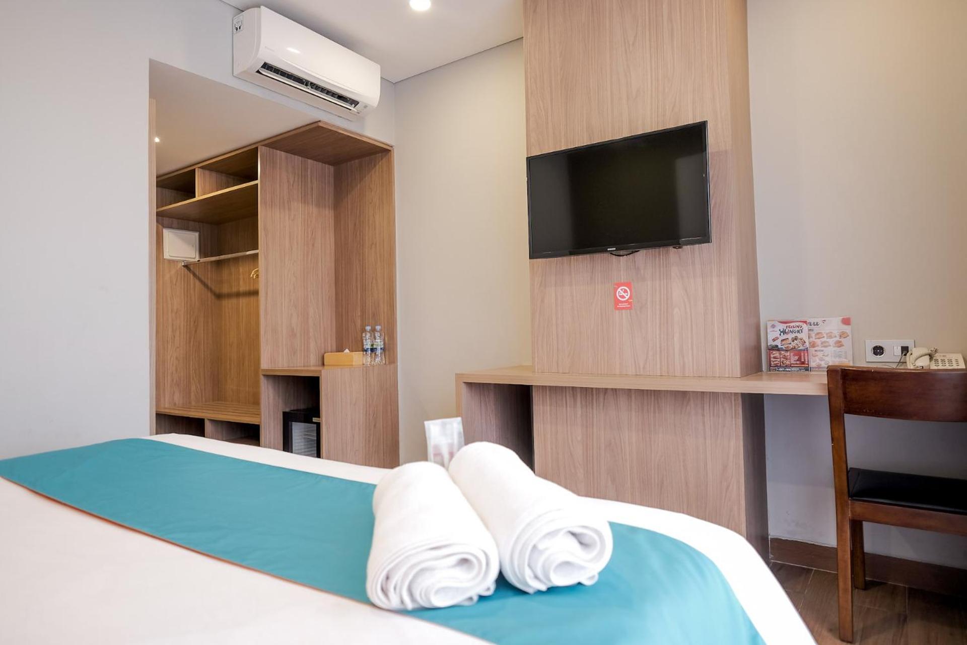 Deluxe Room - Photo 6