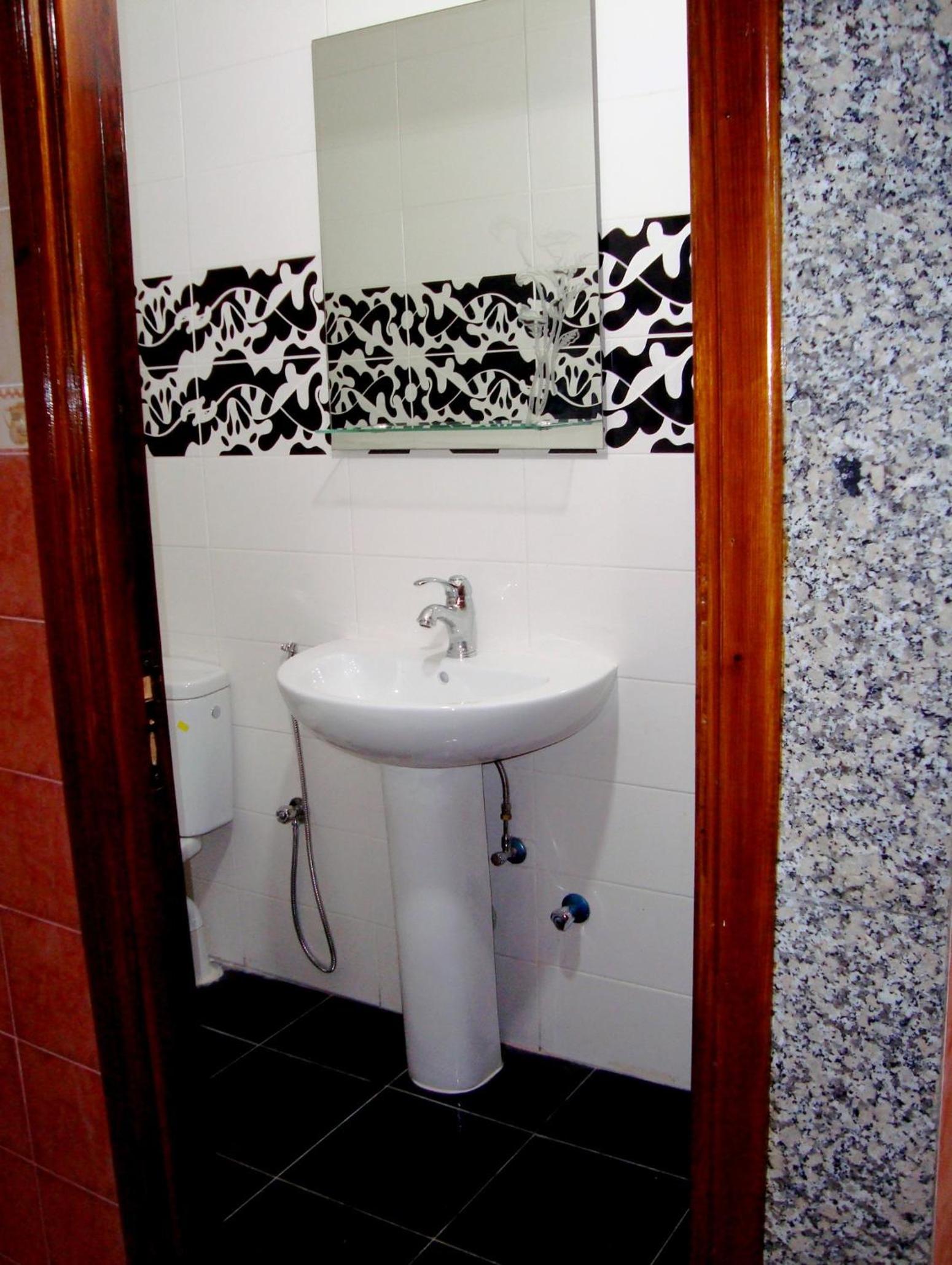 Three-Bedroom Apartment - Photo 16
