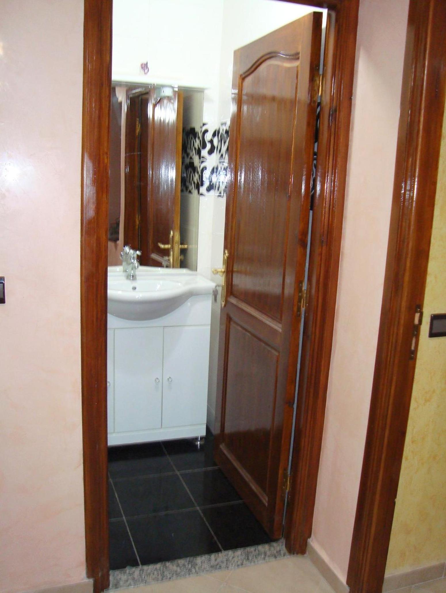 Three-Bedroom Apartment - Photo 12