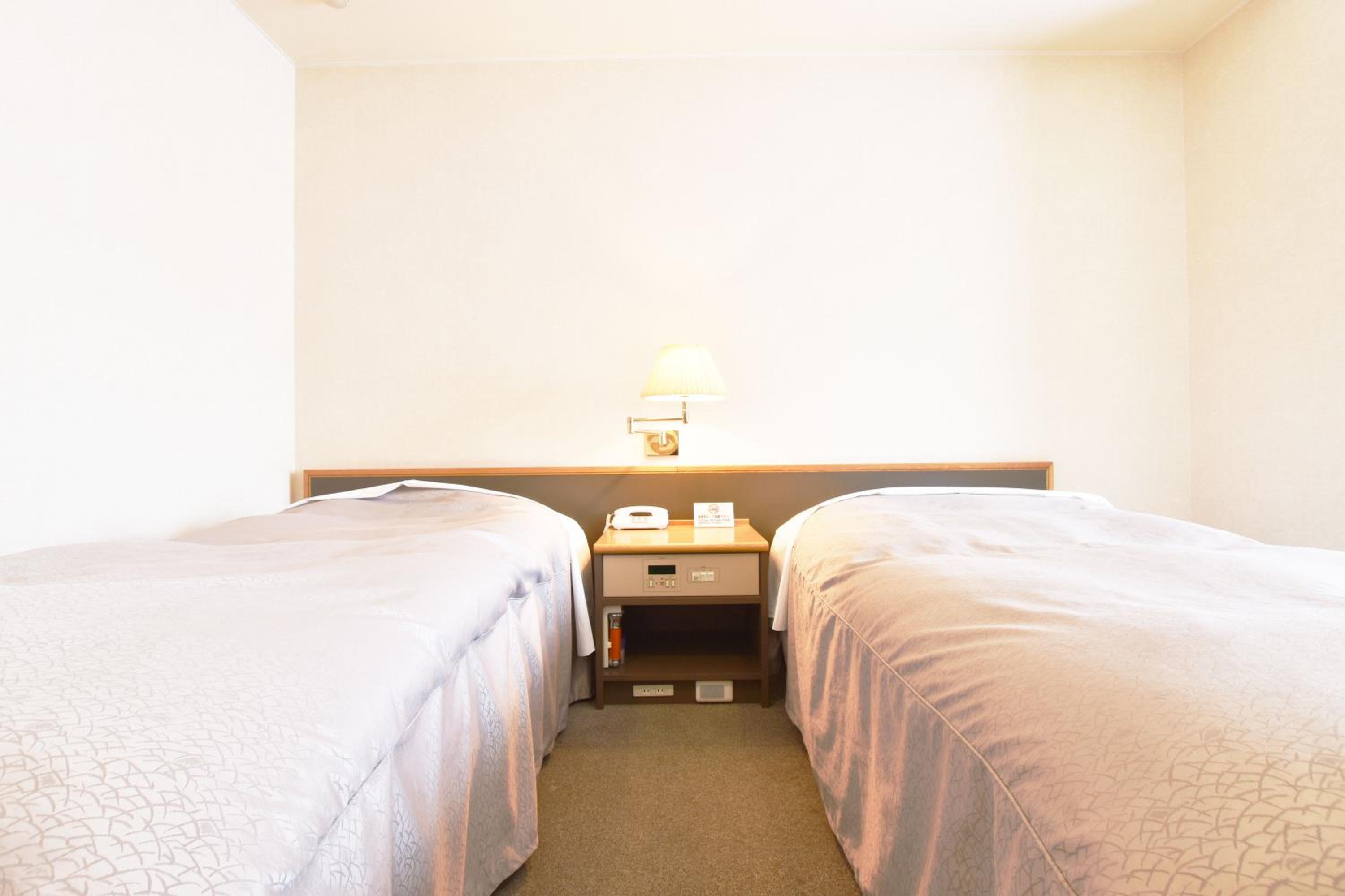 Economy Triple Room with Shared Bathroom photo 1
