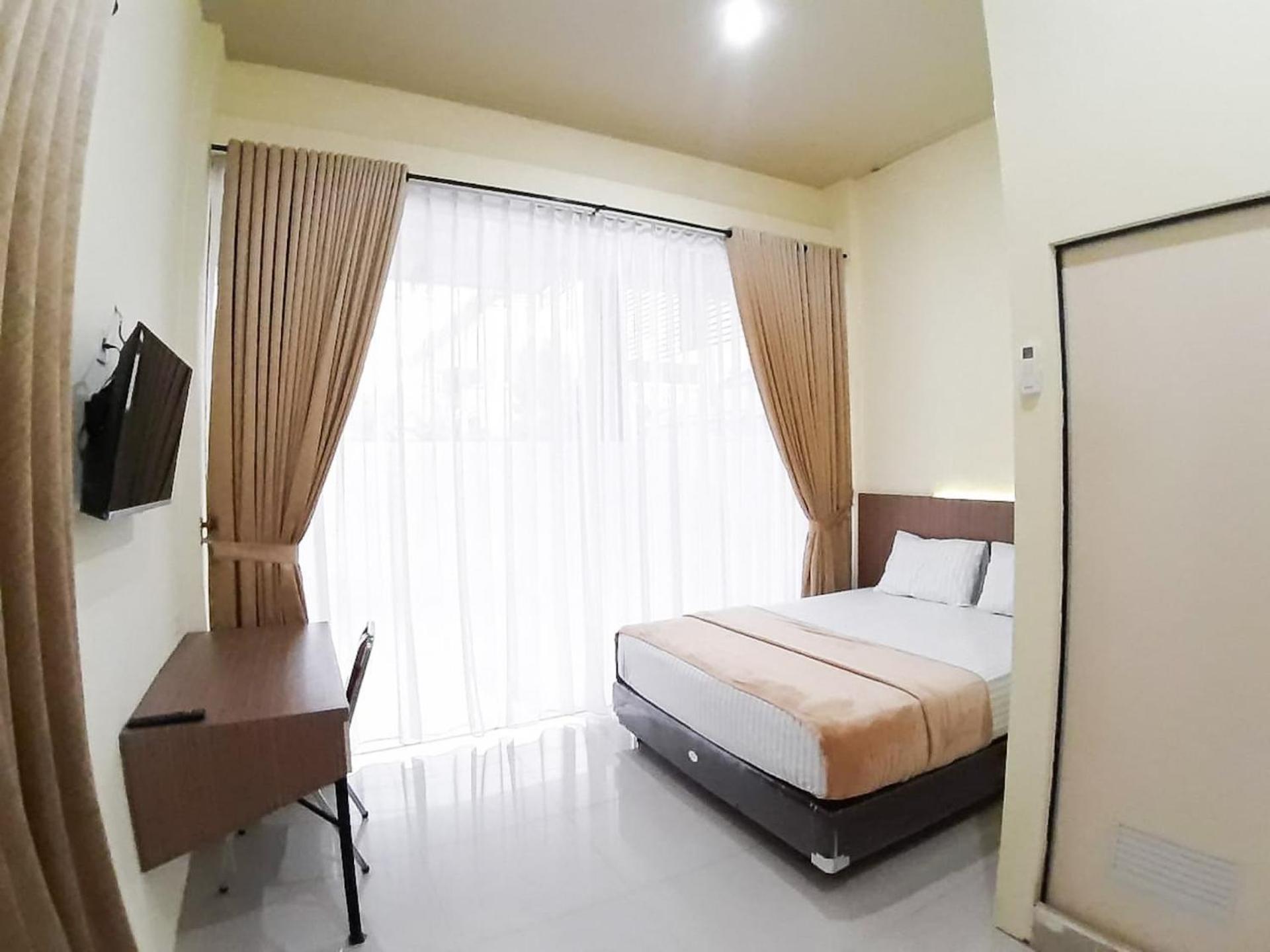 Deluxe Room - Photo 1