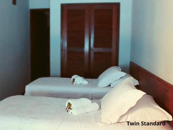 Standard Twin Room - Photo 1