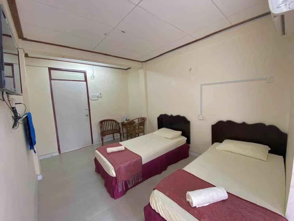Standard Twin Room - Photo 2