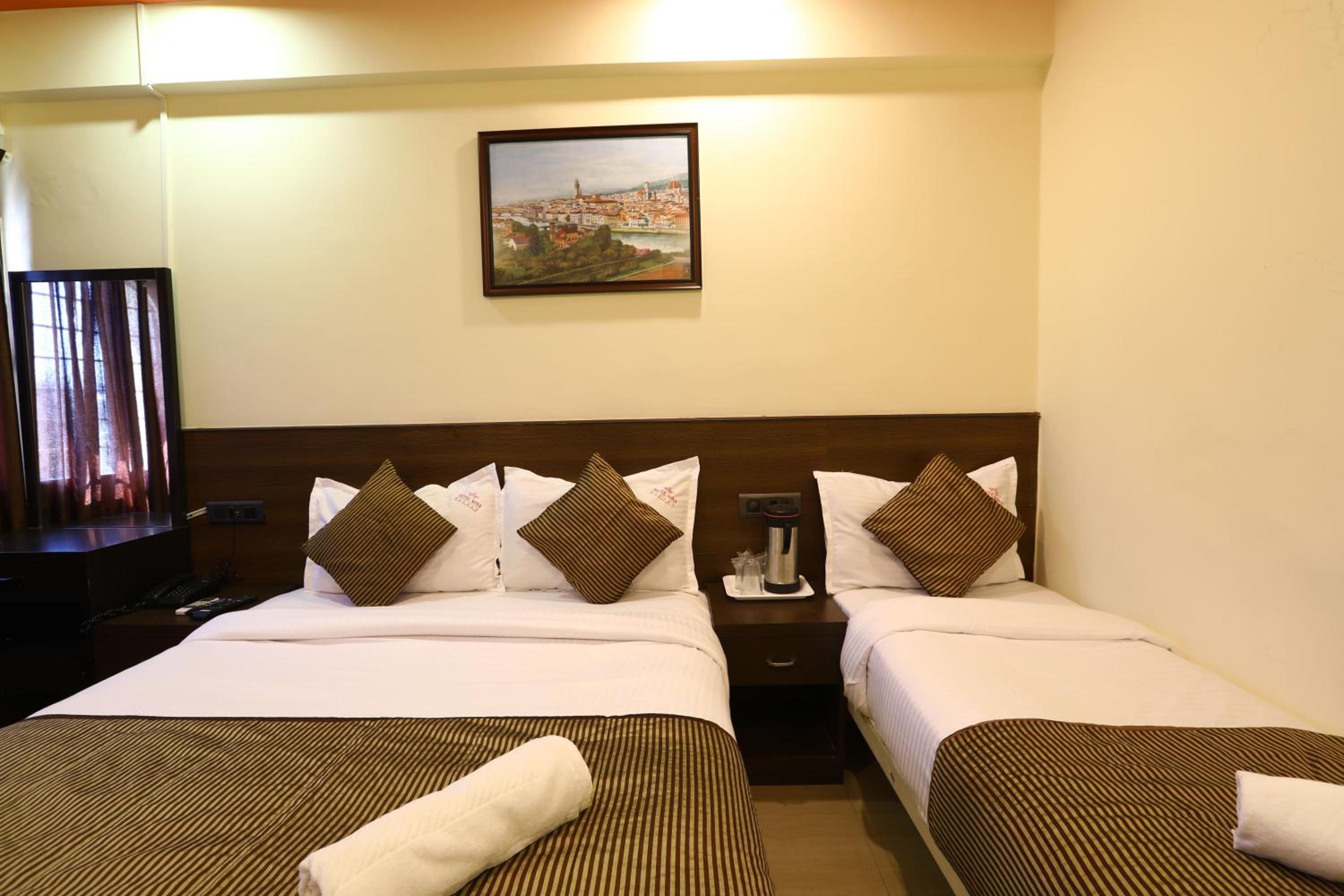 Deluxe Triple Room - Photo 5