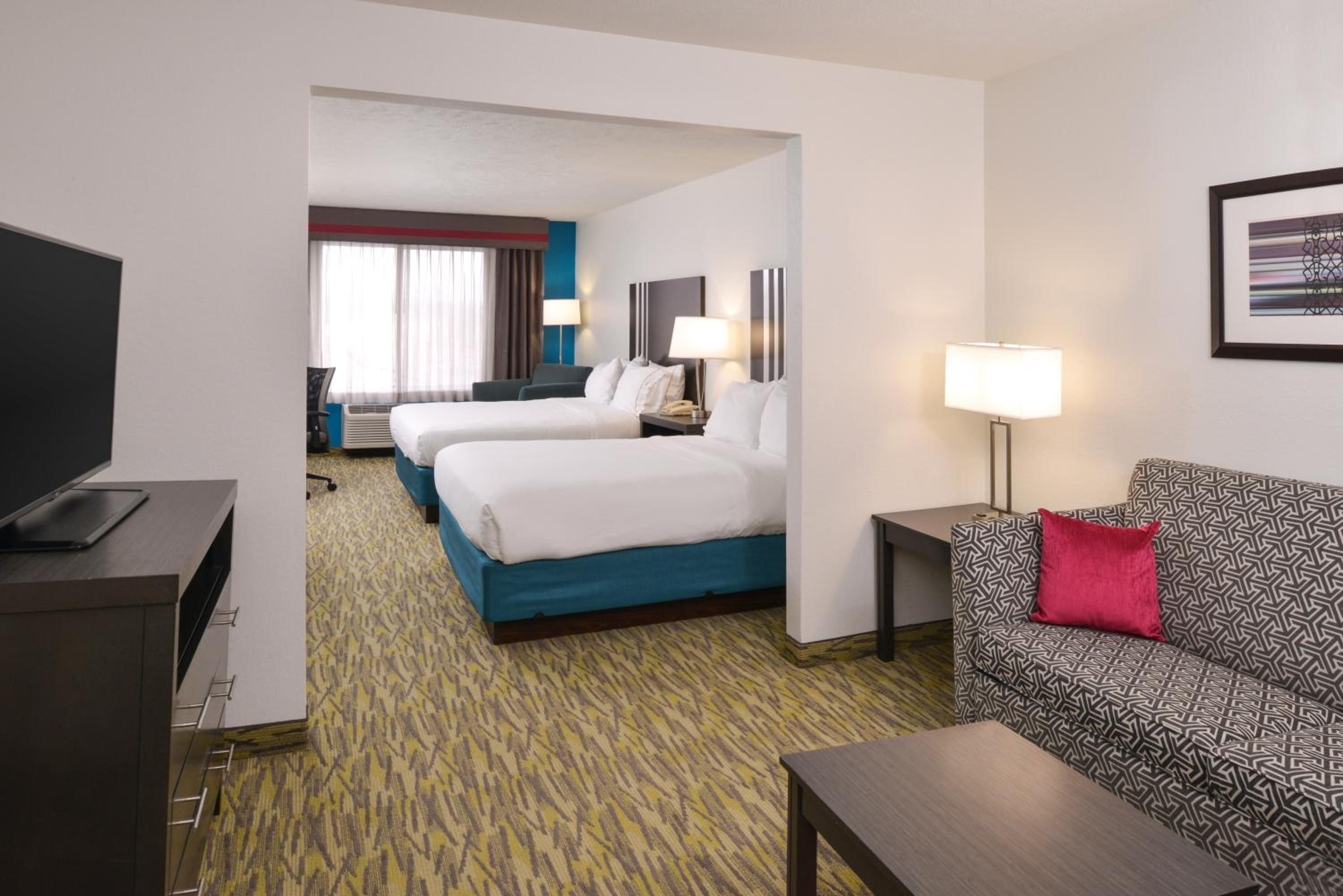 Queen Suite With Two Queen Beds And Sofa Bed